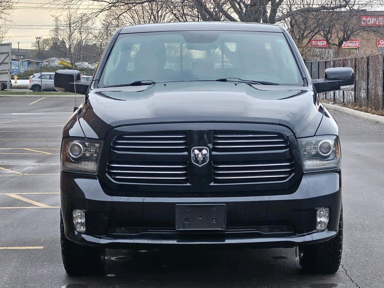 2014 RAM 1500 4WD Quad Cab 140.5 Sport, NO ACCIDENT Photo