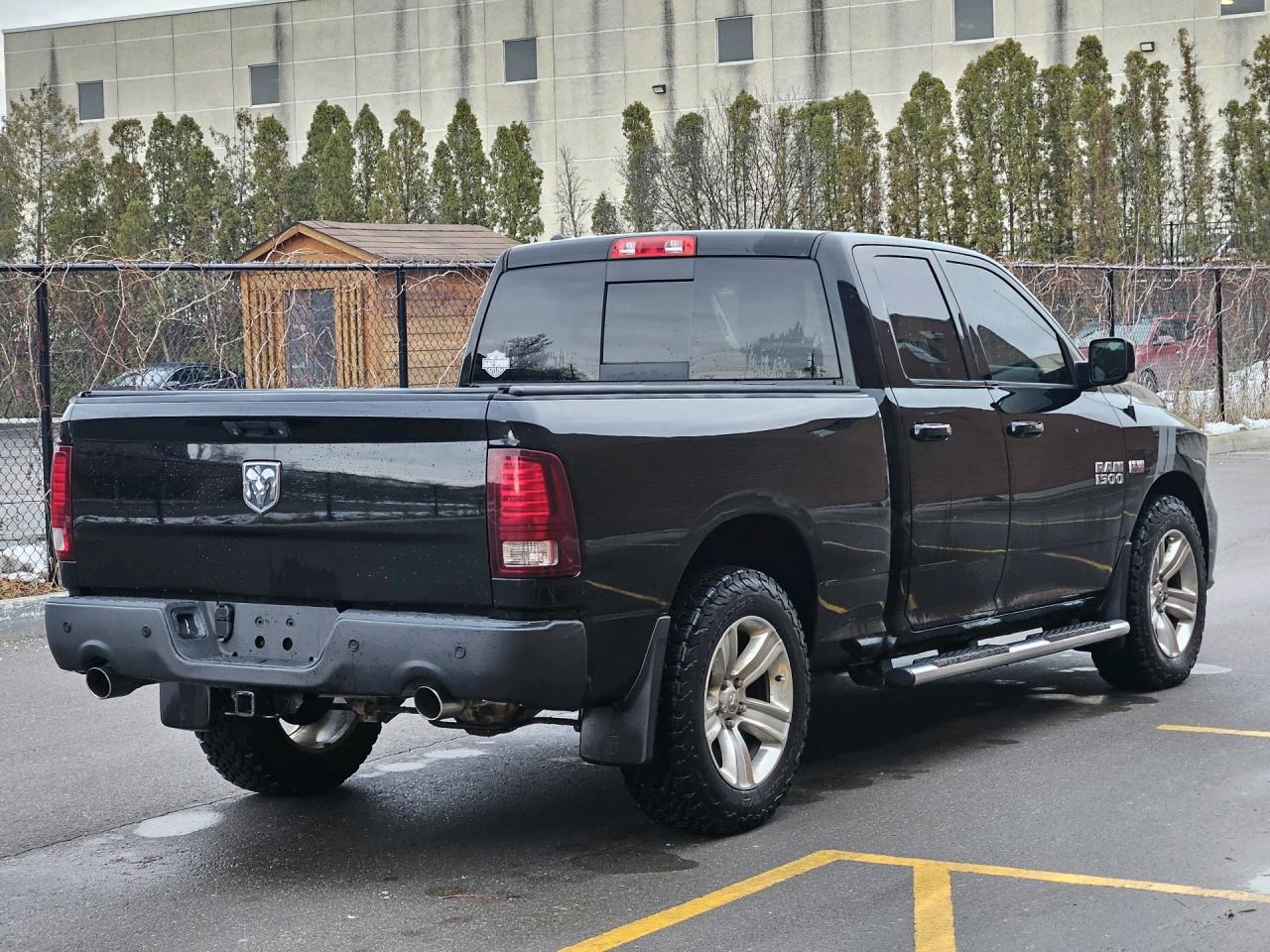 2014 RAM 1500 4WD Quad Cab 140.5 Sport, NO ACCIDENT Photo