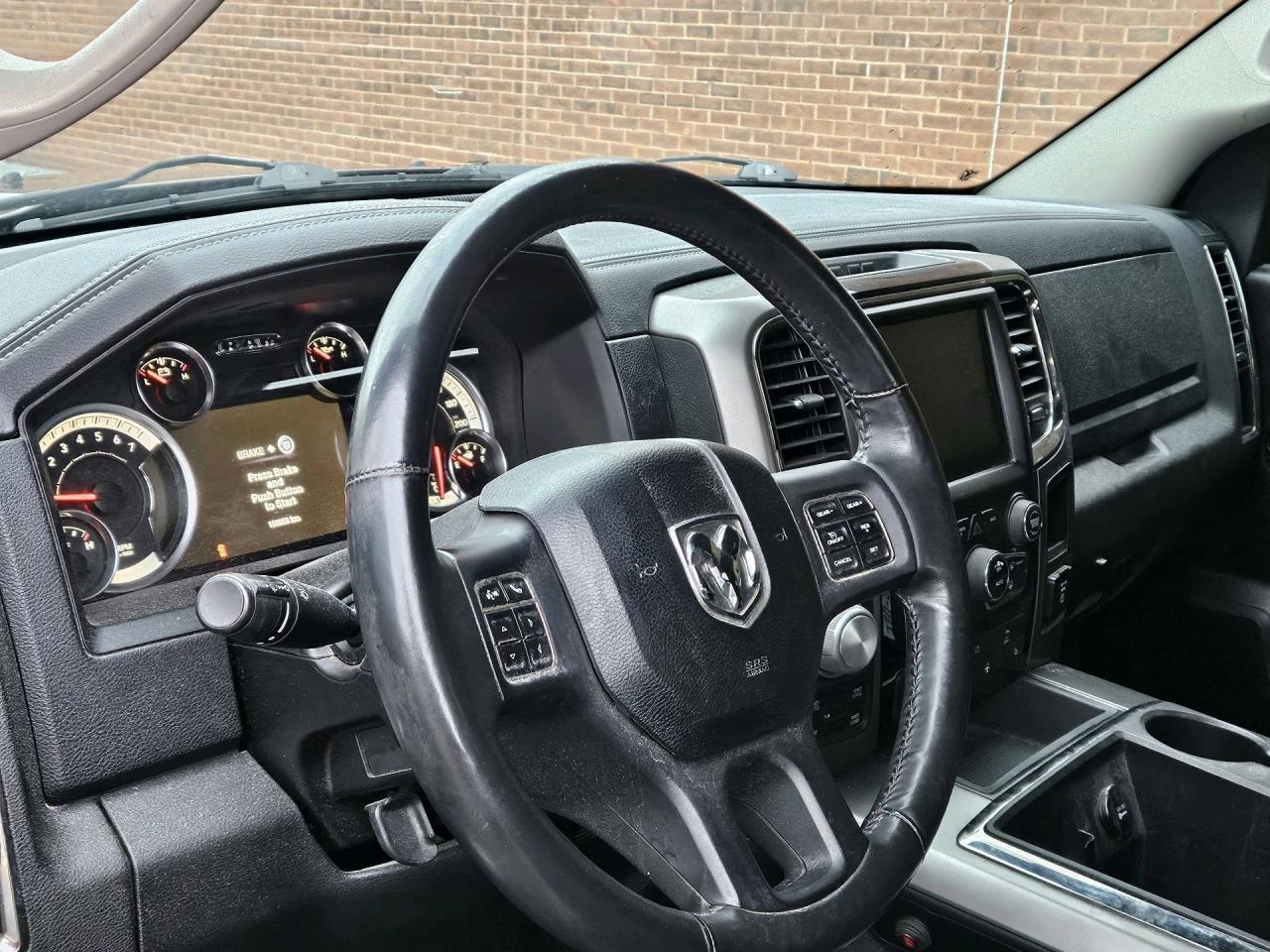 2014 RAM 1500 4WD Quad Cab 140.5 Sport, NO ACCIDENT Photo