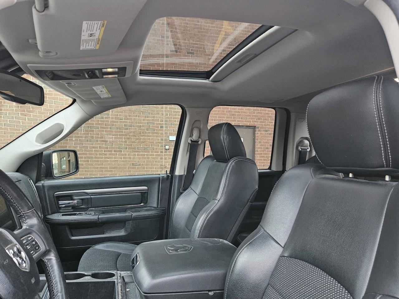 2014 RAM 1500 4WD Quad Cab 140.5 Sport, NO ACCIDENT Photo