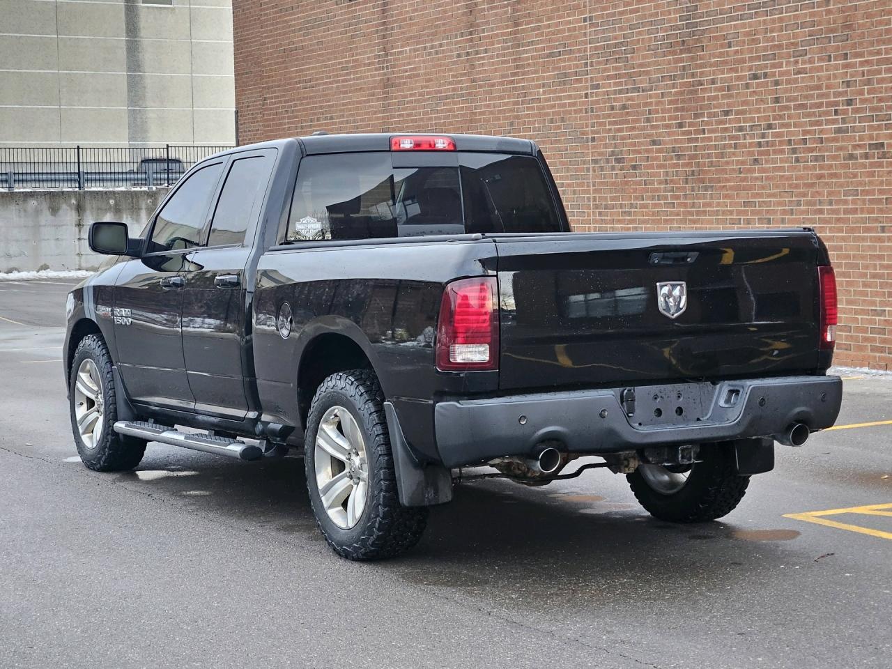 2014 RAM 1500 4WD Quad Cab 140.5 Sport, NO ACCIDENT Photo