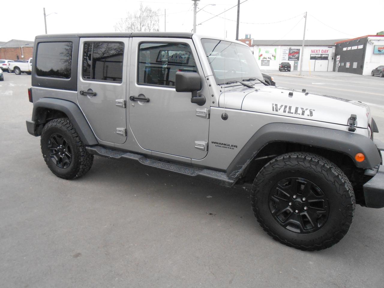 2017 Jeep WRANGLER UNLIMITED 4WD 4dr Willys Wheeler CERTIFIED PRICE Photo2