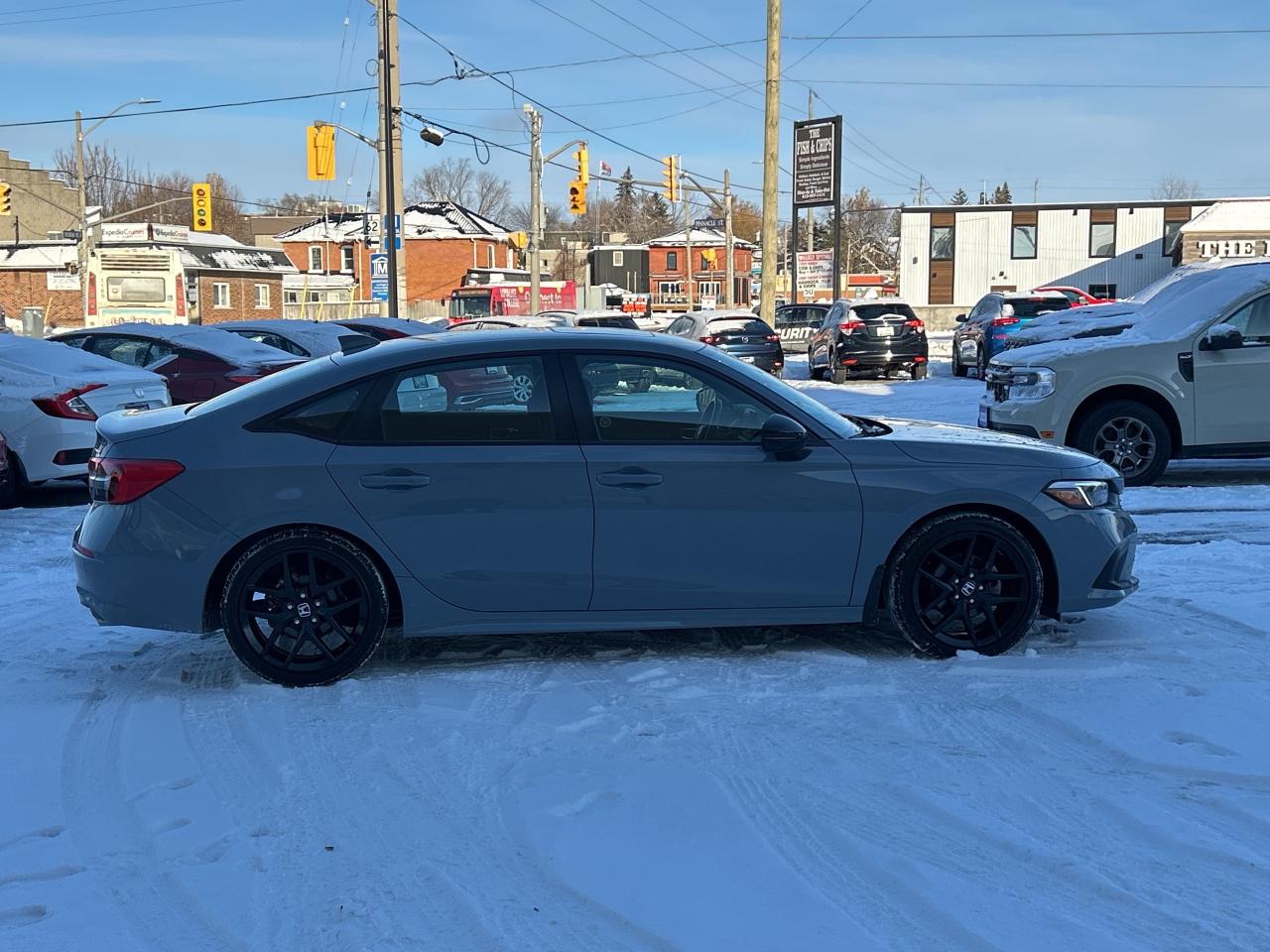 2022 Honda Civic Sedan Sport SUNROOF/HTD SEATS CALL 613-961-8848 62K KMS. Photo
