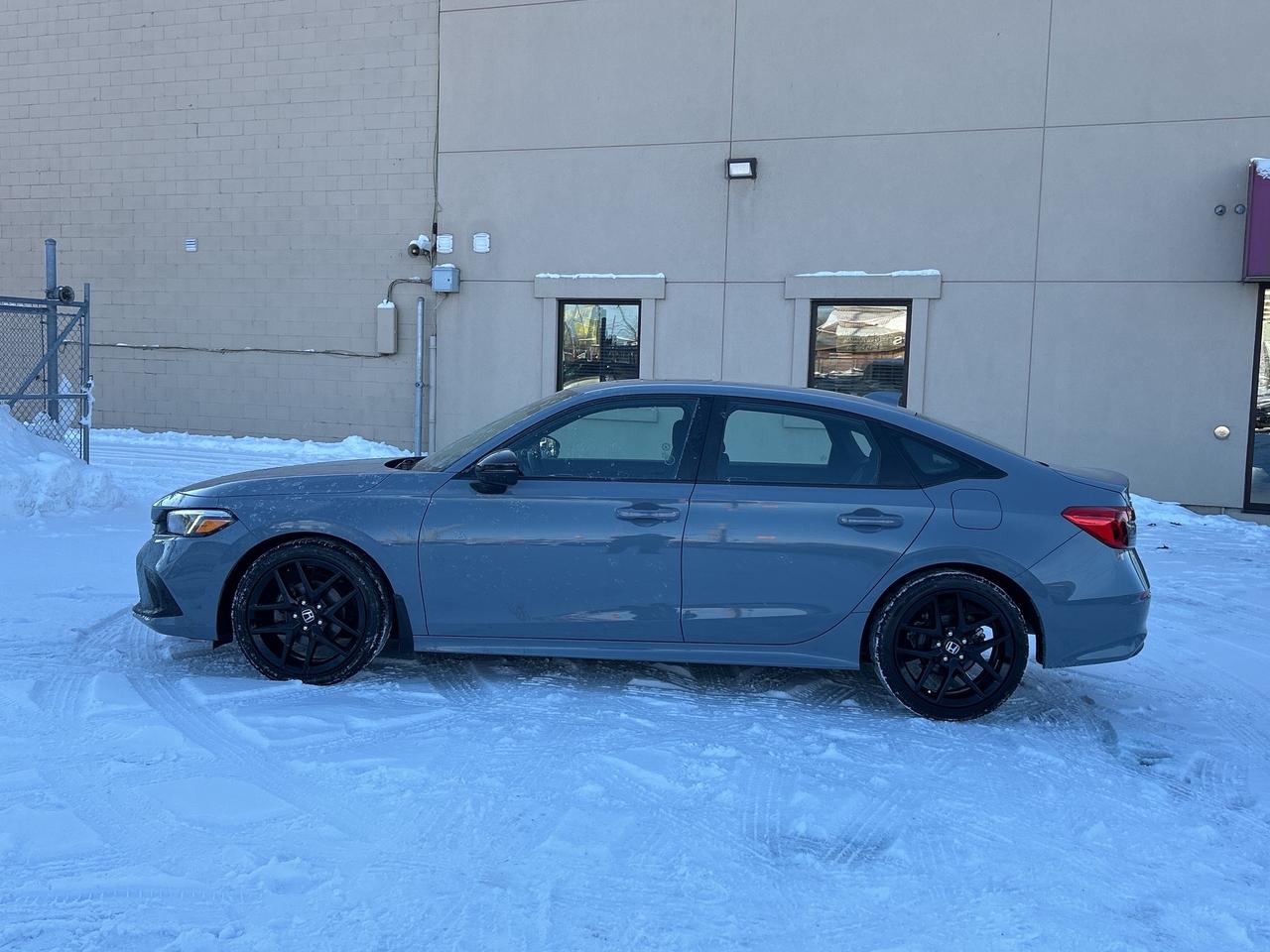2022 Honda Civic Sedan Sport SUNROOF/HTD SEATS CALL 613-961-8848 62K KMS. Photo