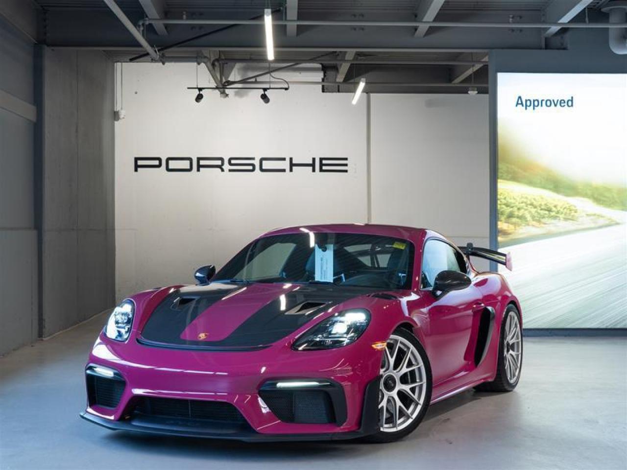 ***Leasing Options Available on Certified Pre-Owned Porsches*** The Porsche that you’ve always wanted. This 2023 718 Cayman GT4 RS (MY23) (over $82,000 of options) has a Clean CarFax Report. With Leather/Race-Tex Interior in Black with Deep Sea Blue Stitching i.c.w. Weissach Package ($2,470), Ruby Star Neo ($4,040), Weissach Package ($15,110), Window Triangle Trims in Carbon Fiber ($720), Deletion of Model Designation on Doors, Deletion of Model Designation on Rear, Front Axle Lift System ($3,470), Chrono Package ($350), Porsche Ceramic Composite Brakes (PCCB) ($9,130), Brake Calipers in High Gloss Black ($1,030), Wheels Painted in Silver, 20 718 Cayman GT4 RS Forged Magnesium Wheels ($17,840), Luggage Net in Passenger Footwell, Vehicle Keys Painted incl. One Key Pouch in Leather ($540), Smoking Package, Seat Belts in Deep Sea Blue ($410), Fire Extinguisher ($160), Steering Column Casing in Leather ($540), Climate Control Panel in Leather ($780), Inner Door-Sill Guards in Leather ($710), Dashboard End Trims in Leather/Race-Tex - Deep Sea Blue ($750), Door Trim Package in Leather/Race-Tex ($780), Sun Visors in Race-Tex ($680), Storage Compartment Lid in Race-Tex with PORSCHE Logo ($380), Door-Sill Guards in Carbon Fiber, Illuminated ($600), BOSE® Surround Sound System ($1,130), Deletion of SiriusXM® Antenna, Sonderwunsch Factory Commissioning (Special Wishes) ($18,135), LED Headlights incl. Porsche Dynamic Light System (PDLS) ($1,710), Light Design Package ($390), and Auto-Dimming Mirrors with Integrated Rain Sensor ($790), this is the car for you! Look for the Porsche Approved seal when buying a pre-owned Porsche. Porsche Approved Pre-Owned Cars are inspected in compliance with our 111-point checklist and any work required is performed using only 100% Porsche Genuine Parts. As proof of the trust that we have in the quality of our vehicles, every certified pre-owned car comes with a minimum of 24 months Porsche Approved Warranty and Porsche Roadside Assistance. The Porsche Approved Warranty covers all components of your Porsche and offers the same level of security as our new car warranty. Luxury Tax is not charged on Certified Pre-Owned vehicles. Call us at 613-749-4275 and ask to speak to one of our Porsche Brand Executives. Serving the Ottawa & Gatineau region. *** Options de location disponibles pour les Porsche doccasion certifiées *** La Porsche de vos rêves. Cette voiture 2023 718 Cayman GT4 RS (MY23) (plus de $82,000  doptionsa) un bon rapport d’historique de véhicule de CarFax. Grâce à Leather/Race-Tex Interior in Black with Deep Sea Blue Stitching i.c.w. Weissach Package ($2,470), Ruby Star Neo ($4,040), Weissach Package ($15,110), Window Triangle Trims in Carbon Fiber ($720), Deletion of Model Designation on Doors, Deletion of Model Designation on Rear, Front Axle Lift System ($3,470), Chrono Package ($350), Porsche Ceramic Composite Brakes (PCCB) ($9,130), Brake Calipers in High Gloss Black ($1,030), Wheels Painted in Silver, 20 718 Cayman GT4 RS Forged Magnesium Wheels ($17,840), Luggage Net in Passenger Footwell, Vehicle Keys Painted incl. One Key Pouch in Leather ($540), Smoking Package, Seat Belts in Deep Sea Blue ($410), Fire Extinguisher ($160), Steering Column Casing in Leather ($540), Climate Control Panel in Leather ($780), Inner Door-Sill Guards in Leather ($710), Dashboard End Trims in Leather/Race-Tex - Deep Sea Blue ($750), Door Trim Package in Leather/Race-Tex ($780), Sun Visors in Race-Tex ($680), Storage Compartment Lid in Race-Tex with PORSCHE Logo ($380), Door-Sill Guards in Carbon Fiber, Illuminated ($600), BOSE® Surround Sound System ($1,130), Deletion of SiriusXM® Antenna, Sonderwunsch Factory Commissioning (Special Wishes) ($18,135), LED Headlights incl. Porsche Dynamic Light System (PDLS) ($1,710), Light Design Package ($390), and Auto-Dimming Mirrors with Integrated Rain Sensor ($790), cette voiture est parfaite pour vous! Trouvez le sceau d’approbation de Porsche lorsque vous achetez une Porsche d’occasion. Les voitures d’occasion approuvées par Porsche sont inspectées conformément à notre liste de vérification de 111 points. Tout travail requis est effectué en utilisant uniquement des pièces d’origine Porsche. Comme preuve de la confiance que nous avons dans la qualité de nos véhicules, chaque voiture d’occasion certifiée fait l’objet d’une garantie d’au moins 24 mois approuvée par Porsche et de l’assistance routière Porsche. La garantie approuvée par Porsche couvre tous les composants de votre Porsche et offre le même niveau de sécurité que notre garantie pour les véhicules neufs. La taxe de luxe n’est pas appliquée aux véhicules d’occasion certifiés. Appelez-nous au 613-749-4275 pour parler à l’un de nos directeurs de marque Porsche. Au service de la région d’Ottawa et du Gatineau.