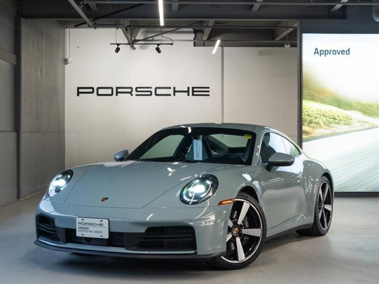 ***Leasing Options Available on Certified Pre-Owned Porsches*** The Porsche that you’ve always wanted. This 2025 911 Carrera has a Clean CarFax Report. With Standard Interior in Black/Limestone Beige ($790), Shade Green Metallic ($3,400), Premium Package ($5,970), Electric Slide/Tilt Sunroof ($1,770), Model Designation on Rear in High Gloss Black ($300), Exclusive Design Fuel Cap ($190), Power Steering Plus ($350), Sport Chrono Package ($2,740), Sport Exhaust System incl. Tailpipes in Black ($3,370), Extended Range Fuel Tank (22.1 gal.) ($260), Wheel Center Caps with Colored Porsche Crest ($220), 20/21 Carrera Classic Wheels ($2,790), Heated GT Sport Steering Wheel in Leather ($370), Porsche Crest on Headrests (Front) ($350), Power Sport Seats (14-way) with Memory Package ($2,650), Rear Seats, Exclusive Design Taillights ($1,180), and Under Door Puddle Light Projectors ($190), this is the car for you! Look for the Porsche Approved seal when buying a pre-owned Porsche. Porsche Approved Pre-Owned Cars are inspected in compliance with our 111-point checklist and any work required is performed using only 100% Porsche Genuine Parts. As proof of the trust that we have in the quality of our vehicles, every certified pre-owned car comes with a minimum of 24 months Porsche Approved Warranty and Porsche Roadside Assistance. The Porsche Approved Warranty covers all components of your Porsche and offers the same level of security as our new car warranty. Luxury Tax is not charged on Certified Pre-Owned vehicles. Call us at 613-749-4275 and ask to speak to one of our Porsche Brand Executives. Serving the Ottawa & Gatineau region. *** Options de location disponibles pour les Porsche doccasion certifiées ***  La Porsche de vos rêves. Cette voiture 2025 911 Carrera a un bon rapport d’historique de véhicule de CarFax. Grâce à Standard Interior in Black/Limestone Beige ($790), Shade Green Metallic ($3,400), Premium Package ($5,970), Electric Slide/Tilt Sunroof ($1,770), Model Designation on Rear in High Gloss Black ($300), Exclusive Design Fuel Cap ($190), Power Steering Plus ($350), Sport Chrono Package ($2,740), Sport Exhaust System incl. Tailpipes in Black ($3,370), Extended Range Fuel Tank (22.1 gal.) ($260), Wheel Center Caps with Colored Porsche Crest ($220), 20/21 Carrera Classic Wheels ($2,790), Heated GT Sport Steering Wheel in Leather ($370), Porsche Crest on Headrests (Front) ($350), Power Sport Seats (14-way) with Memory Package ($2,650), Rear Seats, Exclusive Design Taillights ($1,180), and Under Door Puddle Light Projectors ($190), cette voiture est parfaite pour vous! Trouvez le sceau d’approbation de Porsche lorsque vous achetez une Porsche d’occasion. Les voitures d’occasion approuvées par Porsche sont inspectées conformément à notre liste de vérification de 111 points. Tout travail requis est effectué en utilisant uniquement des pièces d’origine Porsche. Comme preuve de la confiance que nous avons dans la qualité de nos véhicules, chaque voiture d’occasion certifiée fait l’objet d’une garantie d’au moins 24 mois approuvée par Porsche et de l’assistance routière Porsche. La garantie approuvée par Porsche couvre tous les composants de votre Porsche et offre le même niveau de sécurité que notre garantie pour les véhicules neufs. La taxe de luxe n’est pas appliquée aux véhicules d’occasion certifiés. Appelez-nous au 613-749-4275 pour parler à l’un de nos directeurs de marque Porsche. Au service de la région d’Ottawa et du Gatineau.