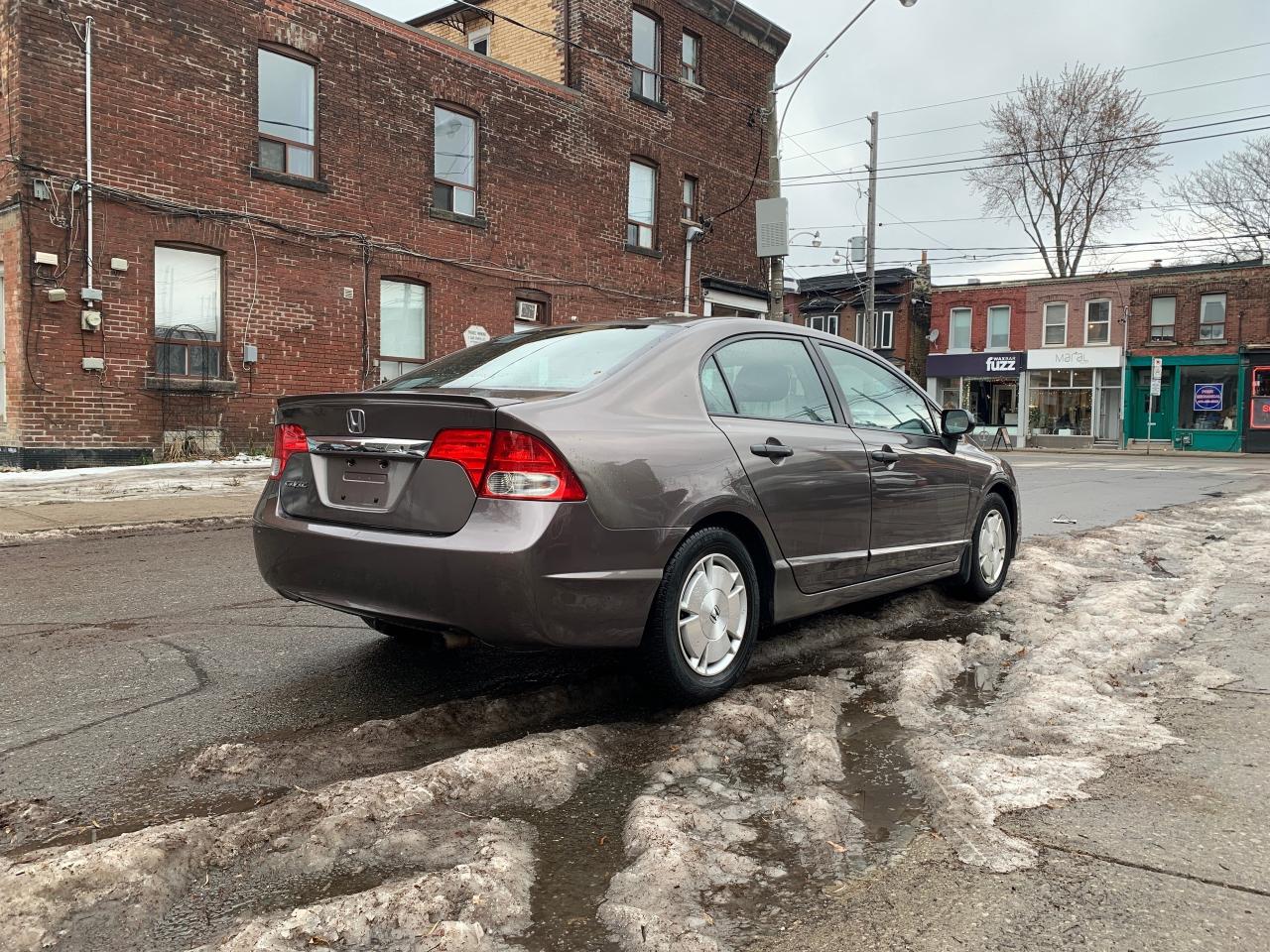 2011 Honda Civic 4dr Auto DX-G Photo