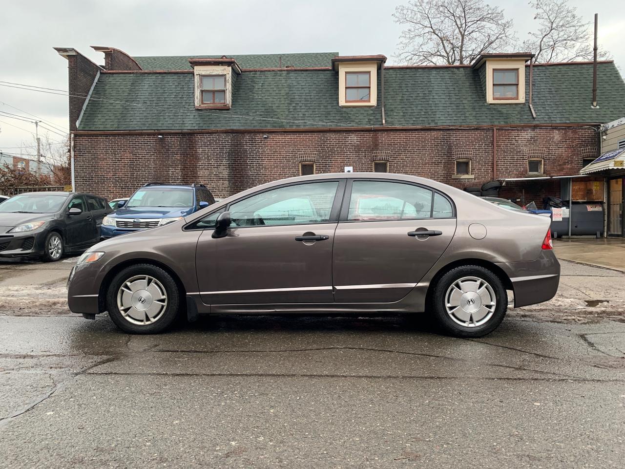 2011 Honda Civic 4dr Auto DX-G Photo