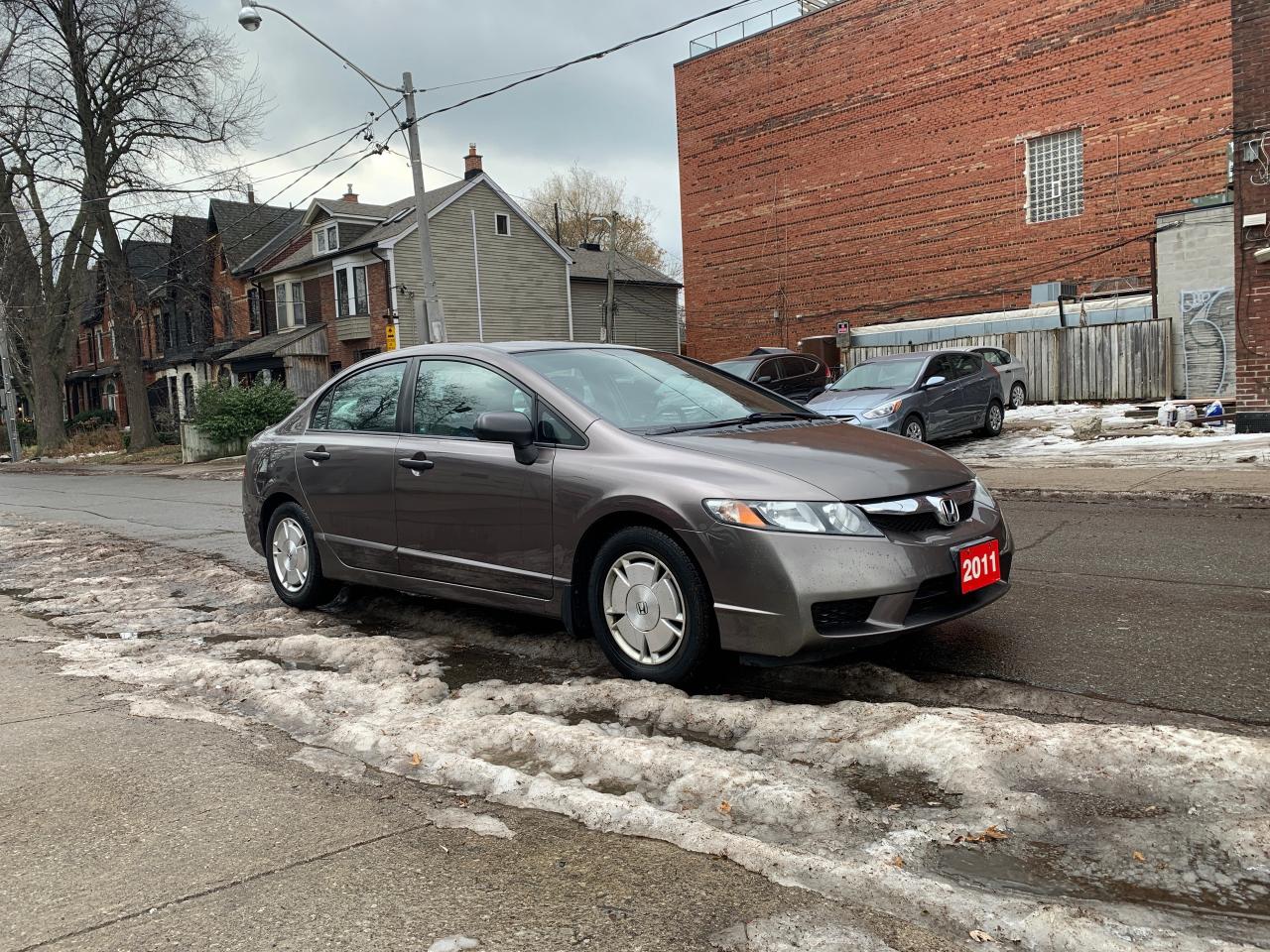 2011 Honda Civic 4dr Auto DX-G Photo