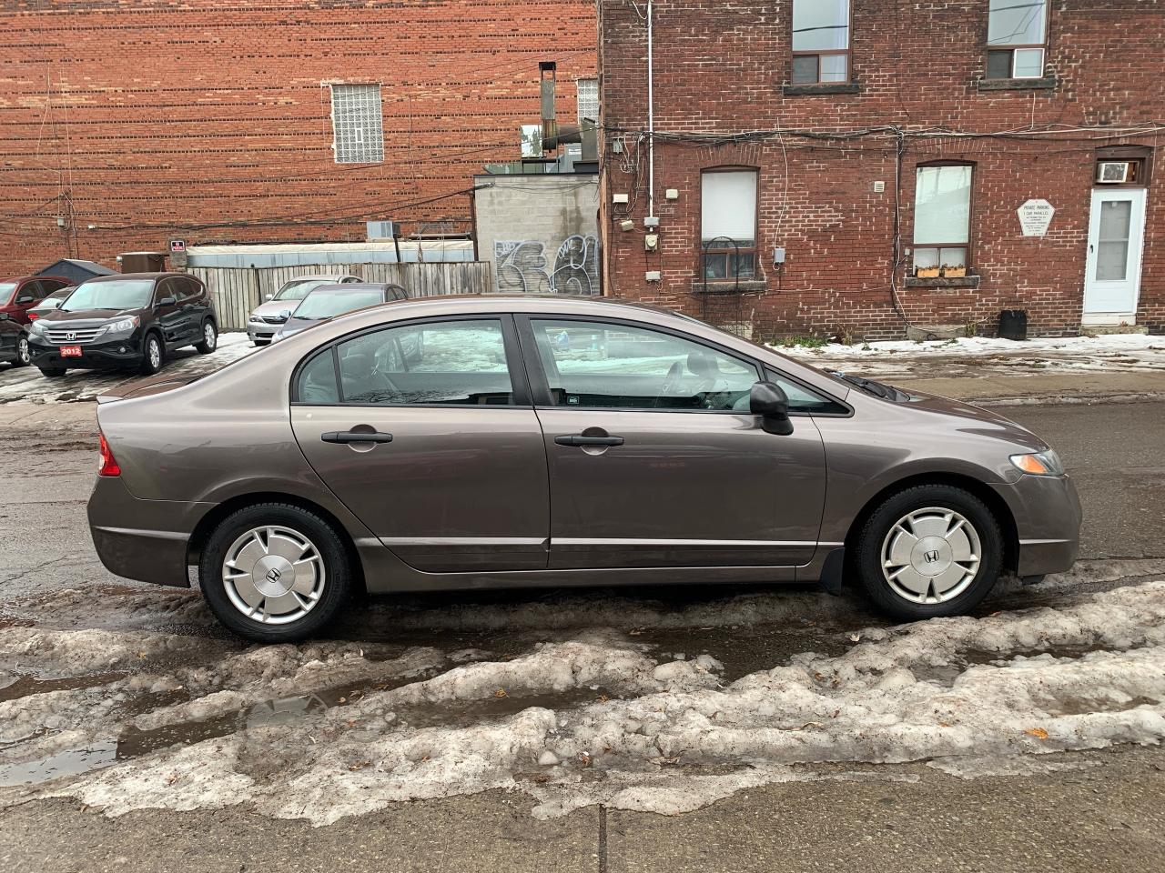 2011 Honda Civic 4dr Auto DX-G Photo