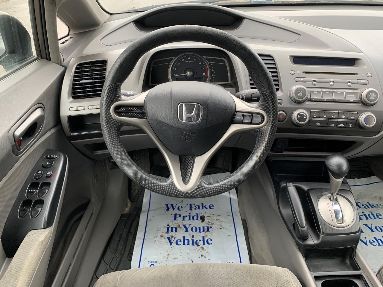 2011 Honda Civic 4dr Auto DX-G Photo