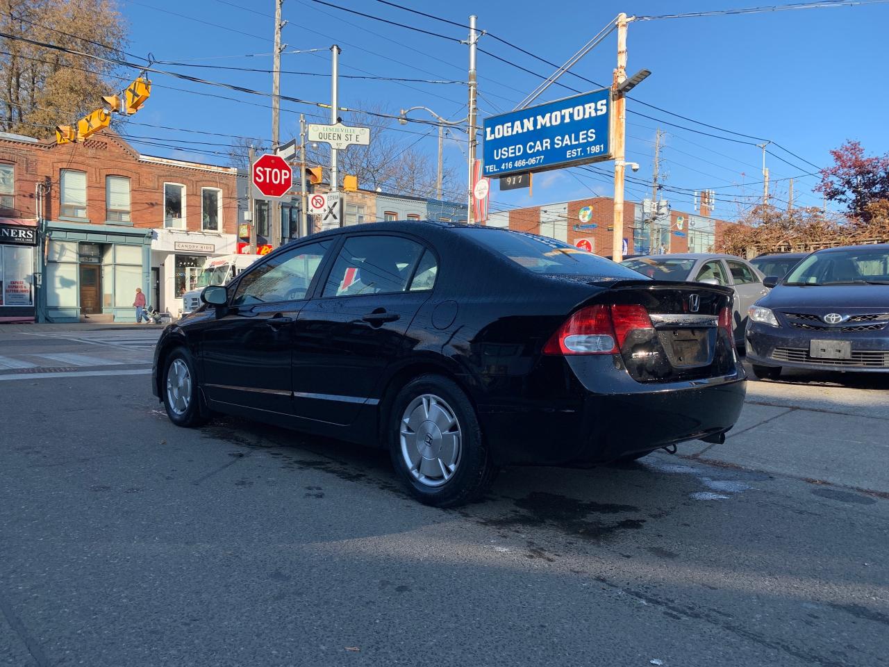 2010 Honda Civic 4dr Auto DX-G Photo2