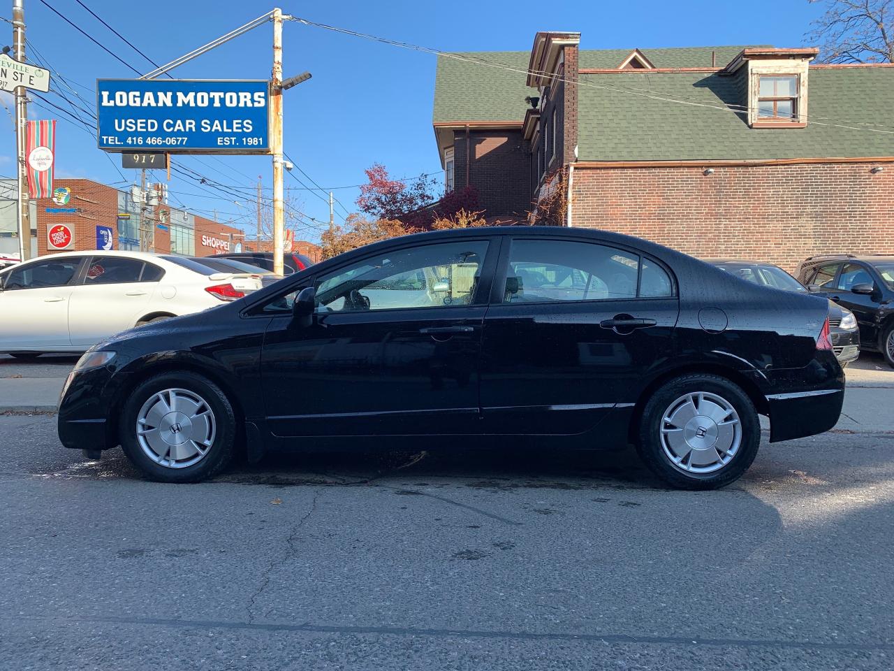 2010 Honda Civic 4dr Auto DX-G Photo