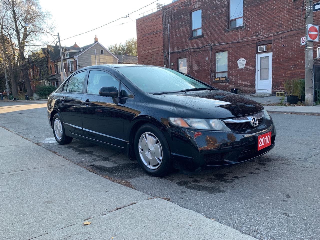 2010 Honda Civic 4dr Auto DX-G Photo