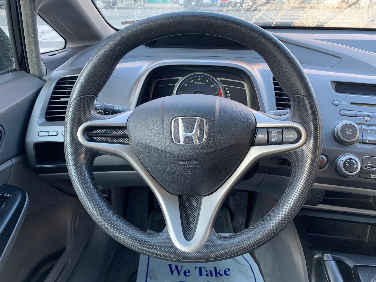 2010 Honda Civic 4dr Auto DX-G Photo