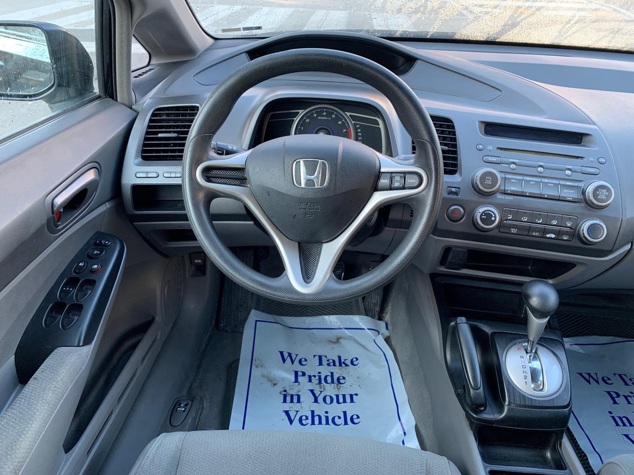 2010 Honda Civic 4dr Auto DX-G Photo