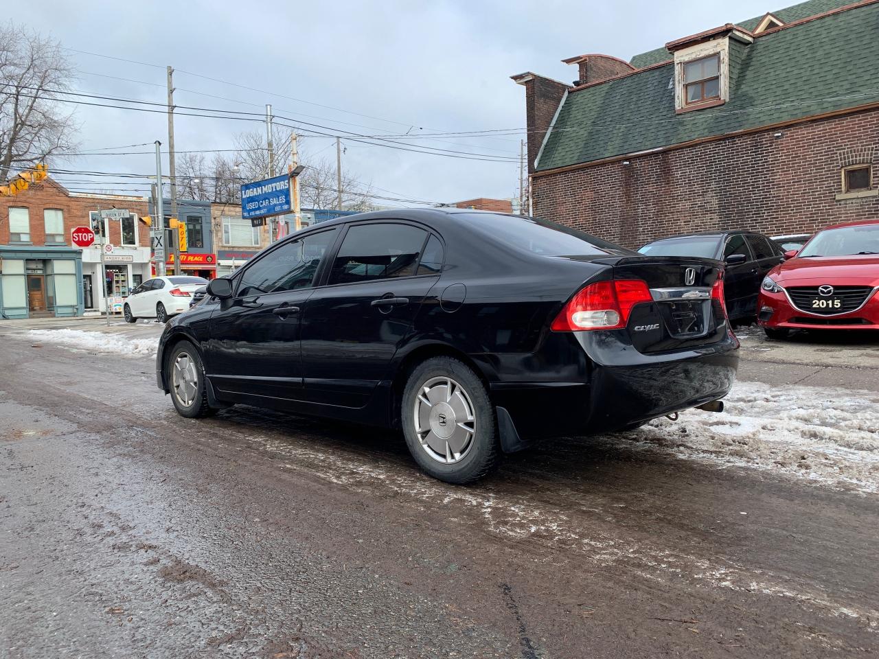 2009 Honda Civic 4dr Auto DX-G Photo