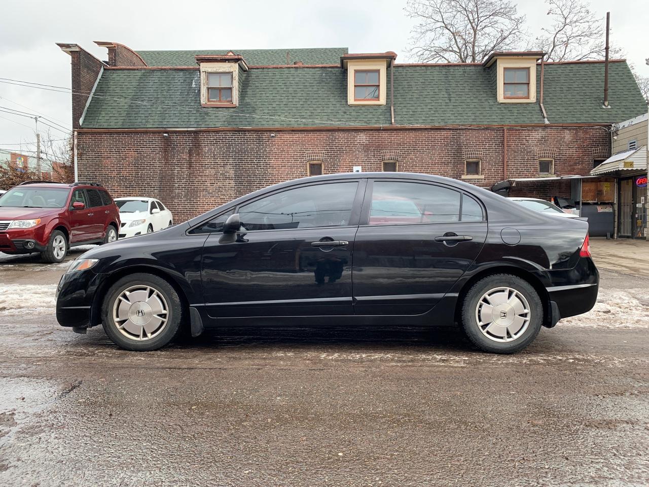 2009 Honda Civic 4dr Auto DX-G Photo