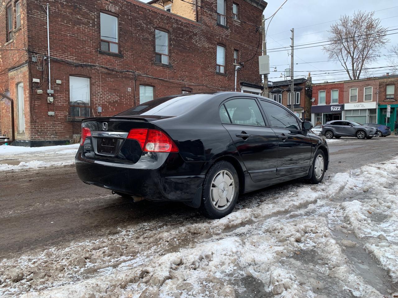 2009 Honda Civic 4dr Auto DX-G Photo4