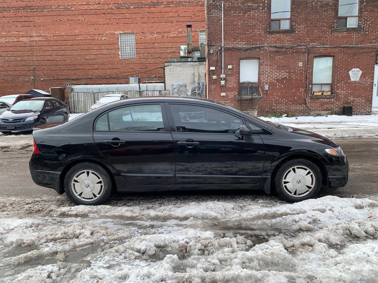 2009 Honda Civic 4dr Auto DX-G Photo