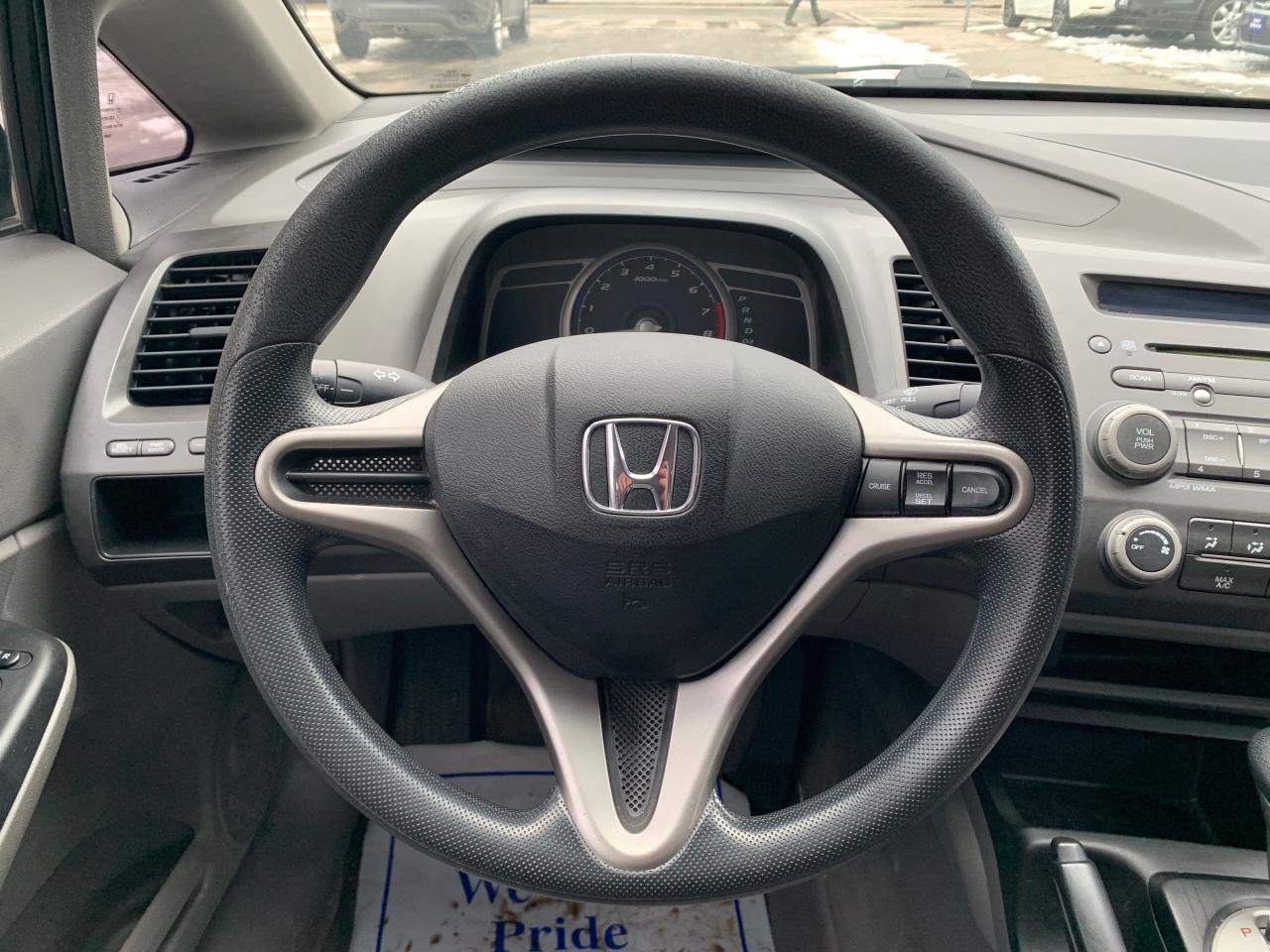 2009 Honda Civic 4dr Auto DX-G Photo