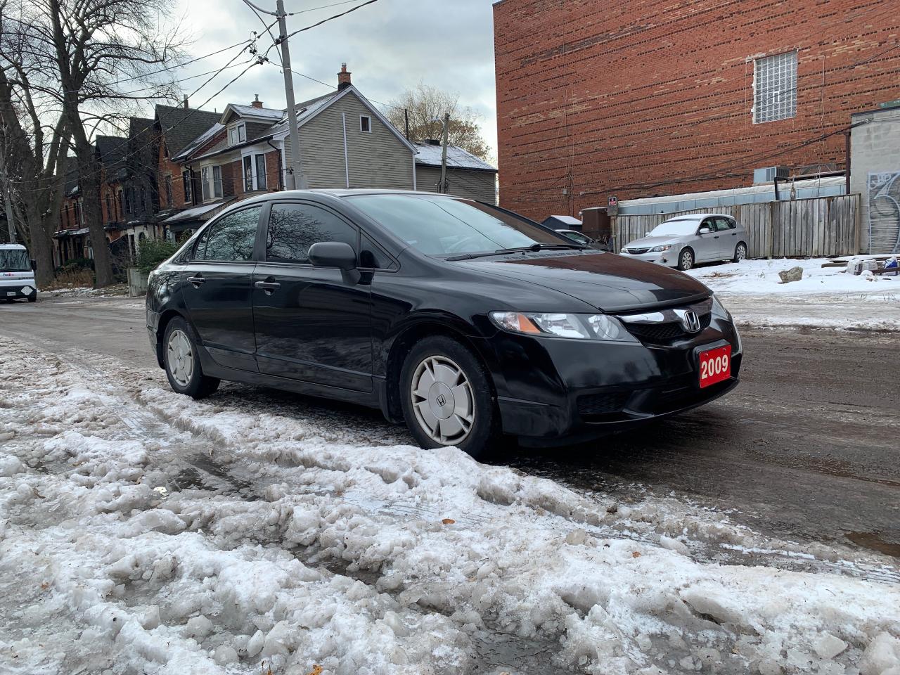 2009 Honda Civic 4dr Auto DX-G Photo