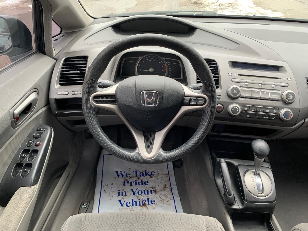 2009 Honda Civic 4dr Auto DX-G Photo