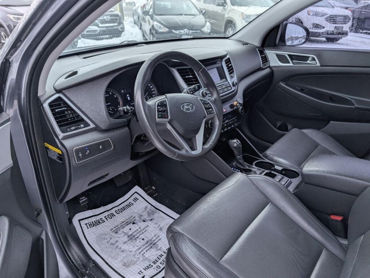 2017 Hyundai Tucson SE AWD  LEATHER   PANOROOF   CAMERA   HTD SEATS Photo