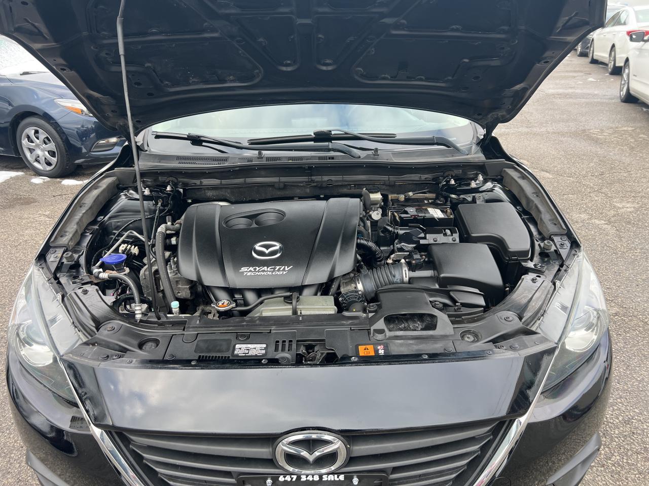 2015 Mazda MAZDA3 4dr Sdn Gx Photo