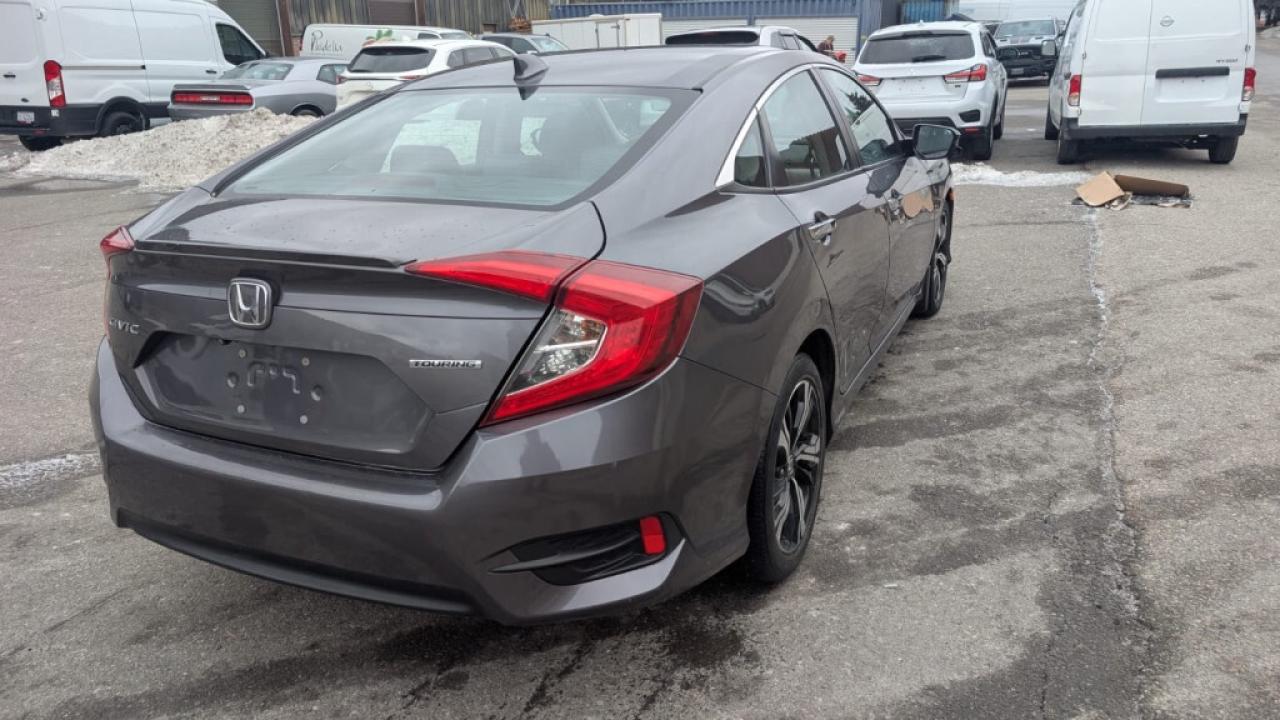 2017 Honda Civic Sedan Touring/Leather/Sunroof/NAVI/Drive Assist/ Blind S Photo