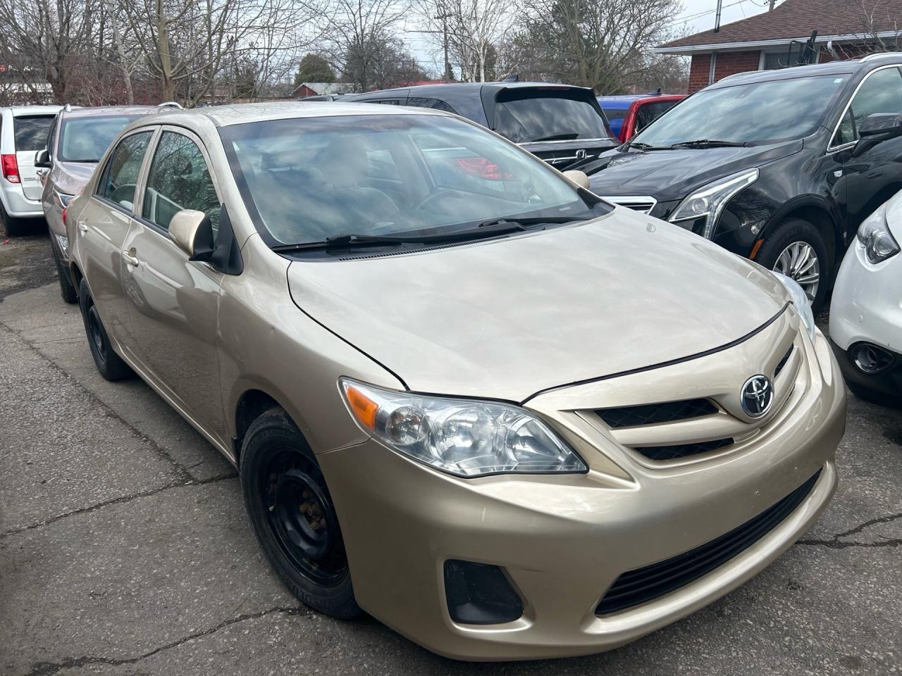 2012 Toyota Corolla 4dr Sdn  CE Photo0