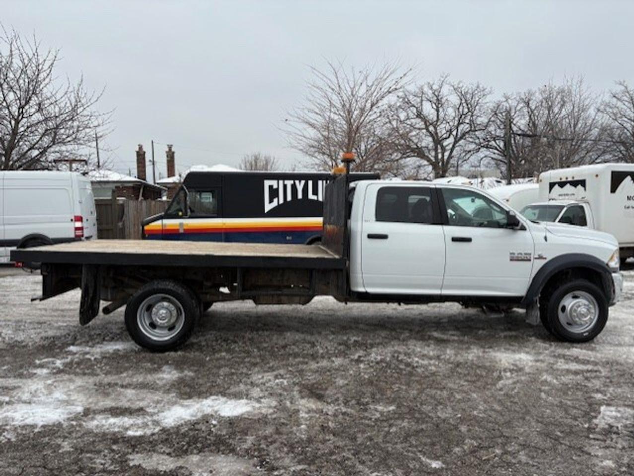 2013 RAM 5500 SLT 4WD 6.7L CUMMINS DIESEL-12' FLAT DECK-CREW CAB Photo