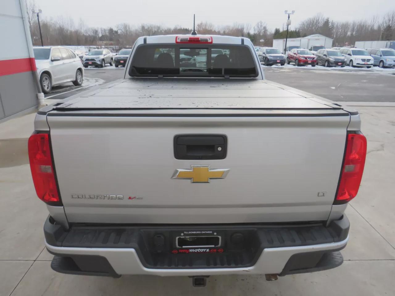 2018 Chevrolet Colorado 2WD LT (**RARE!!**VERY LOW KM!!**SAFETY/CERTIFIED!!**TRAILER HITCH**RUNNING BOARDS**TONNEAU COVER**REMOTE START**FOG LIGHTS**DIGITAL TOUCHSCREEN**REVERSE CAMERA**LEATHER WRAPPED STEERING WHEEL**USB**CRUISE CONTROL**BLUETOOTH**) Photo