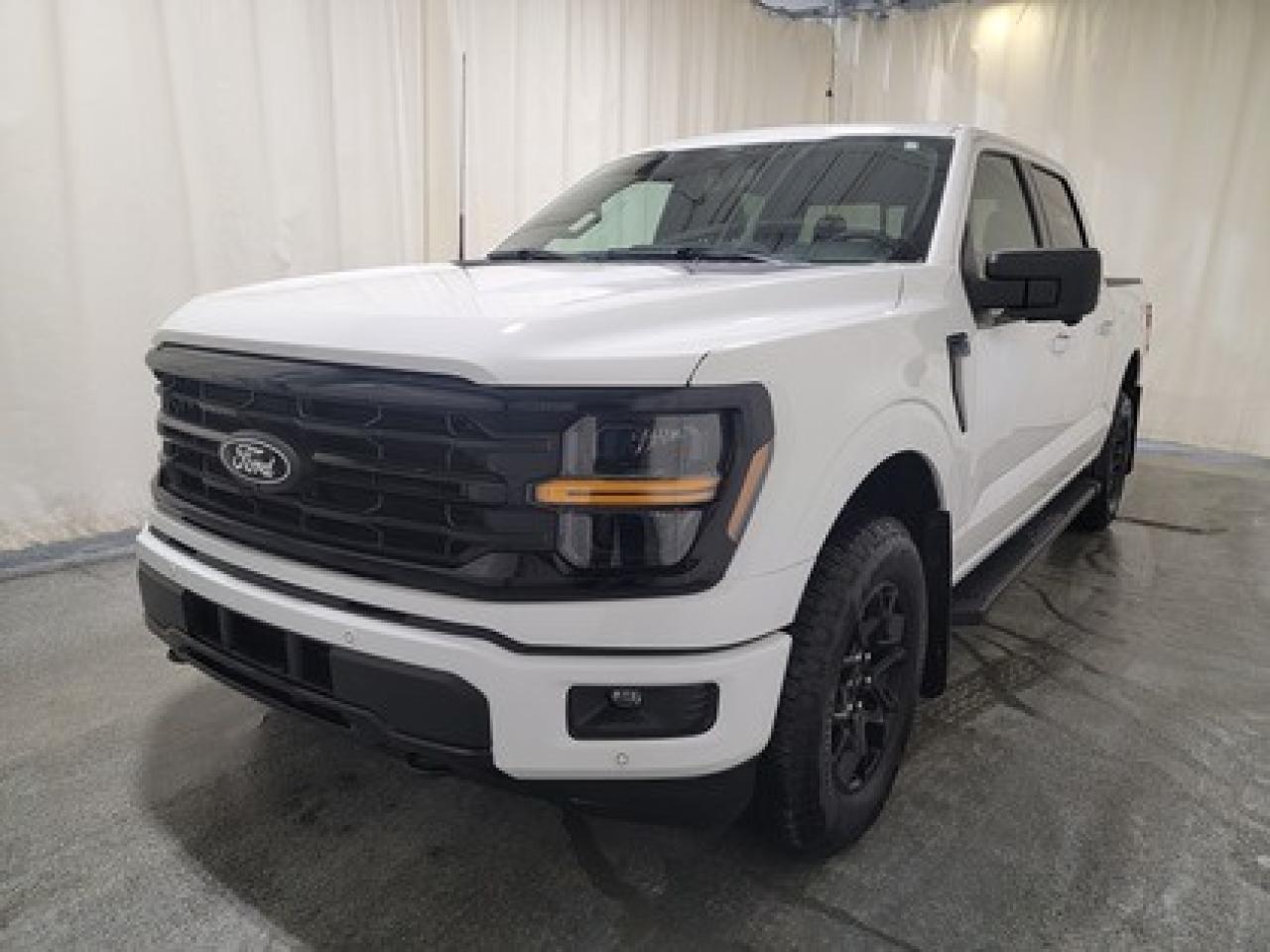 The all-new 2025 Ford F-150 XLT 302A is a statement of style in Oxford White. Powered by the 2.7L EcoBoost engine, it delivers 325 horsepower and 400 lb-ft of torque, paired with a 10-speed automatic transmission. This truck achieves an impressive, combined fuel economy of 11.8 L/100 km (24 miles per gallon).

Key Features:
12 LCD Captivity Touchscreen
Electronic Power-Assist Steering
Dual-Zone Electronic Auto Temp Control
Cruise Control
Power Windows
AdvanceTrac® With Roll Stability Control
Perimeter Alarm
Ford Co-Pilot360
Lane Keeping System
Rear View Camera
Rear Parking Sensors
Reverse Park Assist
Class IV Trailer Hitch
Power Drivers Seat
Remote Start
SYNC®4
Apple Car Play
18 All Terrain Tires
Bluetooth Connectivity
3.73 Electronic Lock RR Axle
XLT Black Appearance Package
Engine Block Heater
FX4 Off Road Package
Bed Utility Package

From navigating Saskatchewan's rugged terrain to hauling gear for your next project, the 2025 Ford F-150 XLT combines capability, technology, and comfort into a trusted workhorse that adapts to your needs. Engineered for durability, the F-150 XLT offers heavy-duty shock absorbers, rear privacy glass, interior worksurface, dual exhaust tips and LED reflector headlamps. Inside, enjoy smart features like power windows, tilt/telescoping steering wheel, and USB charging ports for added convenience. Safety remains a priority with Post Collision Braking, Dynamic Brake Support, and advanced airbag systems.

Bennett Dunlop Ford, proudly serving Regina for over 40 years, is conveniently located at 770 Broad Street. With over 3,500 Google reviews, our reputation reflects our commitment to providing a fast, easy, and enjoyable vehicle-buying experience. We eliminate the hassle with no admin or documentation fees, transparent upfront pricing, and a money-back guarantee that lets you shop with total confidence. But were more than just a dealershipwere driven to make a difference by supporting local community initiatives and events that matter to you. Visit Bennett Dunlop Ford today and experience why were Reginas trusted choice for quality vehicles, exceptional service, and a genuine commitment to driving change in our community!