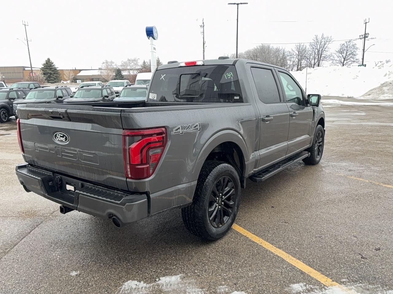 2026 Ford F-150 LARIAT, BLACK APPEARANCE, TWIN PANEL MOONROOF Photo4