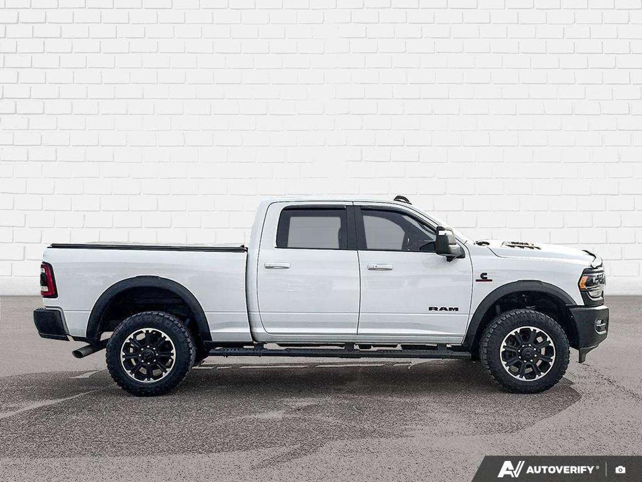 2024 RAM 2500 RUNNING BOARDS. ALL WEATHER MATS. TONNEAU COVER. HEATED BACK SEATS. TRAILER REVERSE GUIDANCE. CERTIFIED. Photo