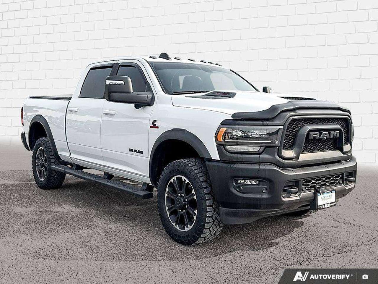2024 RAM 2500 RUNNING BOARDS. ALL WEATHER MATS. TONNEAU COVER. HEATED BACK SEATS. TRAILER REVERSE GUIDANCE. CERTIFIED. Photo