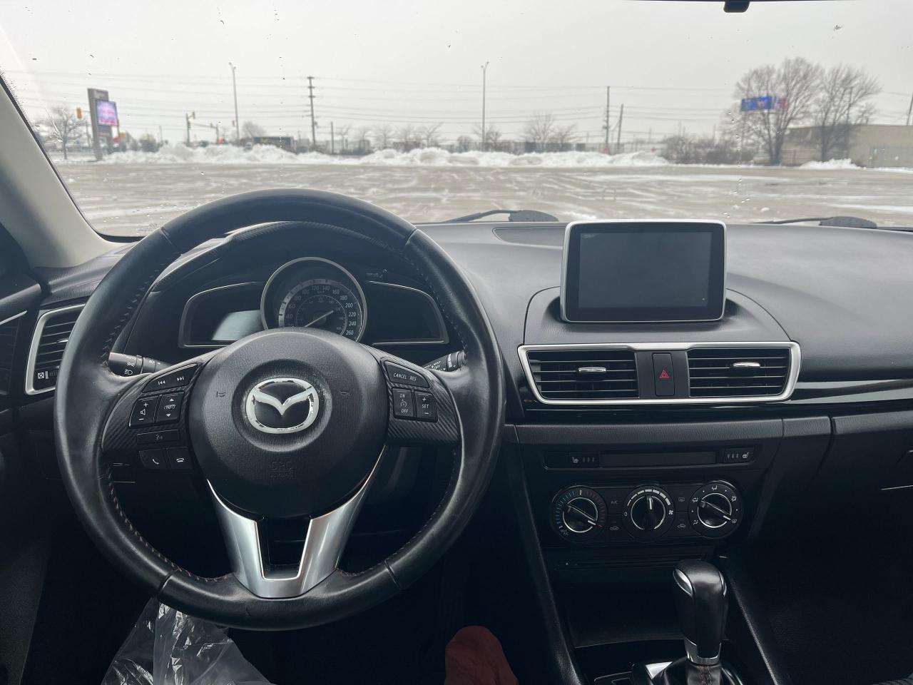 2014 Mazda MAZDA3 4dr Sdn Auto GS-SKY Photo