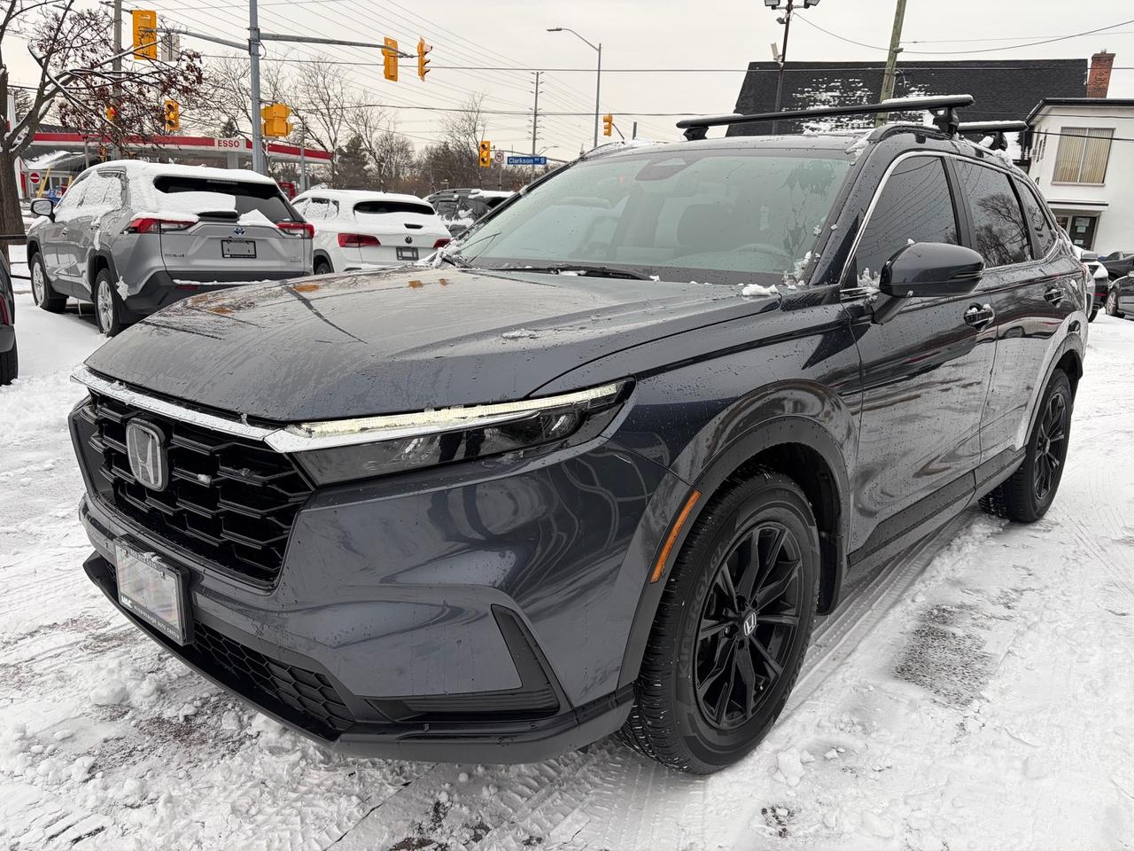 <h3 data-path-to-node=2><strong data-path-to-node=2 data-index-in-node=0>2023 Honda CR-V Sport AWD &ndash; Meteorite Gray Metallic &ndash; 91,000 KM</strong></h3><p data-path-to-node=3><strong data-path-to-node=3 data-index-in-node=0>Description:</strong> Elevate your daily drive with the redesigned <strong data-path-to-node=3 data-index-in-node=58>2023 Honda CR-V Sport AWD</strong>. This sixth-generation SUV is finished in the sophisticated <strong data-path-to-node=3 data-index-in-node=144>Meteorite Gray Metallic</strong> with a sleek <strong data-path-to-node=3 data-index-in-node=181>Black Sport Cloth</strong> interior. The Sport trim stands out with exclusive gloss black exterior accents, Berlina Black 18-inch alloy wheels, and a bold honeycomb grille.</p><p data-path-to-node=4>With <strong data-path-to-node=4 data-index-in-node=5>91,000 km</strong>, this&nbsp;<strong>one owner, accident free</strong> vehicle offers the perfect balance of Honda&rsquo;s legendary reliability and modern versatility. The Real Time AWD system and specialized Snow Mode ensure confidence in Canadian winters, while the turbocharged engine provides a responsive and fuel-efficient experience.</p><p data-path-to-node=5><strong data-path-to-node=5 data-index-in-node=0>Pricing & Transparency:</strong></p><ul data-path-to-node=6><li><p data-path-to-node=6,0,0><strong data-path-to-node=6,0,0 data-index-in-node=0>Certified:</strong> This vehicle is sold fully certified following a comprehensive safety inspection.</p></li><li><p data-path-to-node=6,1,0><strong data-path-to-node=6,1,0 data-index-in-node=0>All-In Pricing:</strong> Our price includes the <strong data-path-to-node=6,1,0 data-index-in-node=39>Admin Fee</strong> and <strong data-path-to-node=6,1,0 data-index-in-node=53>OMVIC fee</strong>.</p></li><li><p data-path-to-node=6,2,0><em data-path-to-node=6,2,0 data-index-in-node=0>Note: Price is plus HST and Licensing.</em></p></li></ul><p data-path-to-node=7><strong data-path-to-node=7 data-index-in-node=0>Performance & Mechanical Highlights:</strong></p><ul data-path-to-node=8><li><p data-path-to-node=8,0,0><strong data-path-to-node=8,0,0 data-index-in-node=0>Engine:</strong> 1.5L 16-Valve DOHC VTEC Turbocharged 4-Cylinder</p></li><li><p data-path-to-node=8,1,0><strong data-path-to-node=8,1,0 data-index-in-node=0>Power:</strong> 190 hp @ 6,000 rpm</p></li><li><p data-path-to-node=8,2,0><strong data-path-to-node=8,2,0 data-index-in-node=0>Transmission:</strong> Continuously Variable Transmission (CVT)</p></li><li><p data-path-to-node=8,3,0><strong data-path-to-node=8,3,0 data-index-in-node=0>Drivetrain:</strong> Real Time AWD&trade; with Intelligent Control System&trade;</p></li><li><p data-path-to-node=8,4,0><strong data-path-to-node=8,4,0 data-index-in-node=0>Fuel Economy:</strong> Excellent efficiency at approximately 8.4L/100km combined.</p></li></ul><p data-path-to-node=9><strong data-path-to-node=9 data-index-in-node=0>Key Features:</strong></p><ul data-path-to-node=10><li><p data-path-to-node=10,0,0><strong data-path-to-node=10,0,0 data-index-in-node=0>Exterior:</strong> Gloss black roof rails, black window trim, and dual chrome exhaust finishers.</p></li><li><p data-path-to-node=10,1,0><strong data-path-to-node=10,1,0 data-index-in-node=0>Interior:</strong> Heated front seats, 8-way power driver&rsquo;s seat, and heated leather-wrapped steering wheel.</p></li><li><p data-path-to-node=10,2,0><strong data-path-to-node=10,2,0 data-index-in-node=0>Convenience:</strong> One-touch power moonroof, power tailgate with programmable height, and remote engine start.</p></li><li><p data-path-to-node=10,3,0><strong data-path-to-node=10,3,0 data-index-in-node=0>Technology:</strong> 7-inch touchscreen with Apple CarPlay&reg; and Android Auto&trade; integration.</p></li><li><p data-path-to-node=10,4,0><strong data-path-to-node=10,4,0 data-index-in-node=0>Safety:</strong> Honda Sensing&reg; Suite (Adaptive Cruise Control, Lane Keeping Assist, and Collision Mitigation Braking).</p></li></ul>