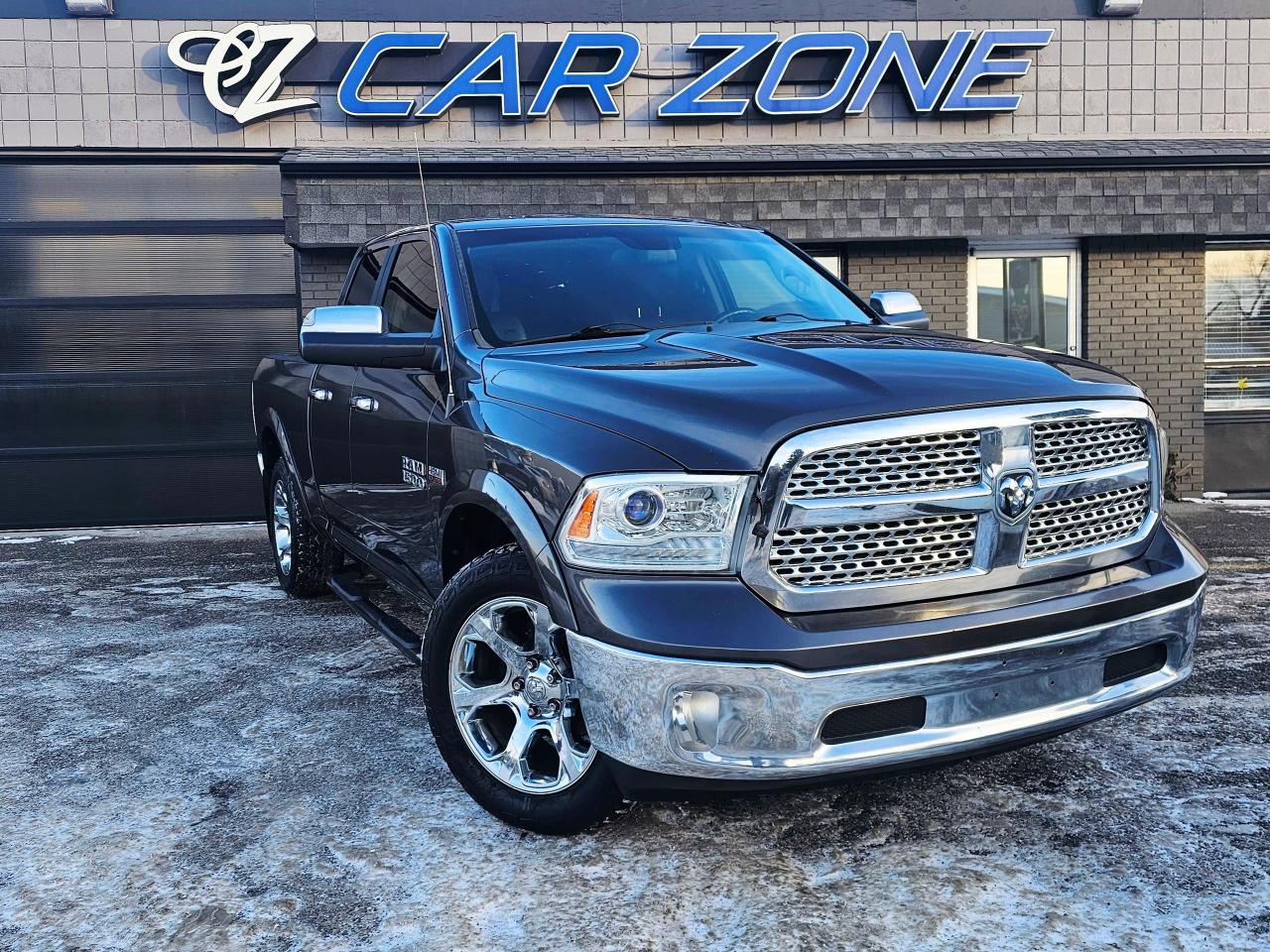2014 RAM 1500 Laramie | 4WD | Quad Cab 140.5" - Photo #1