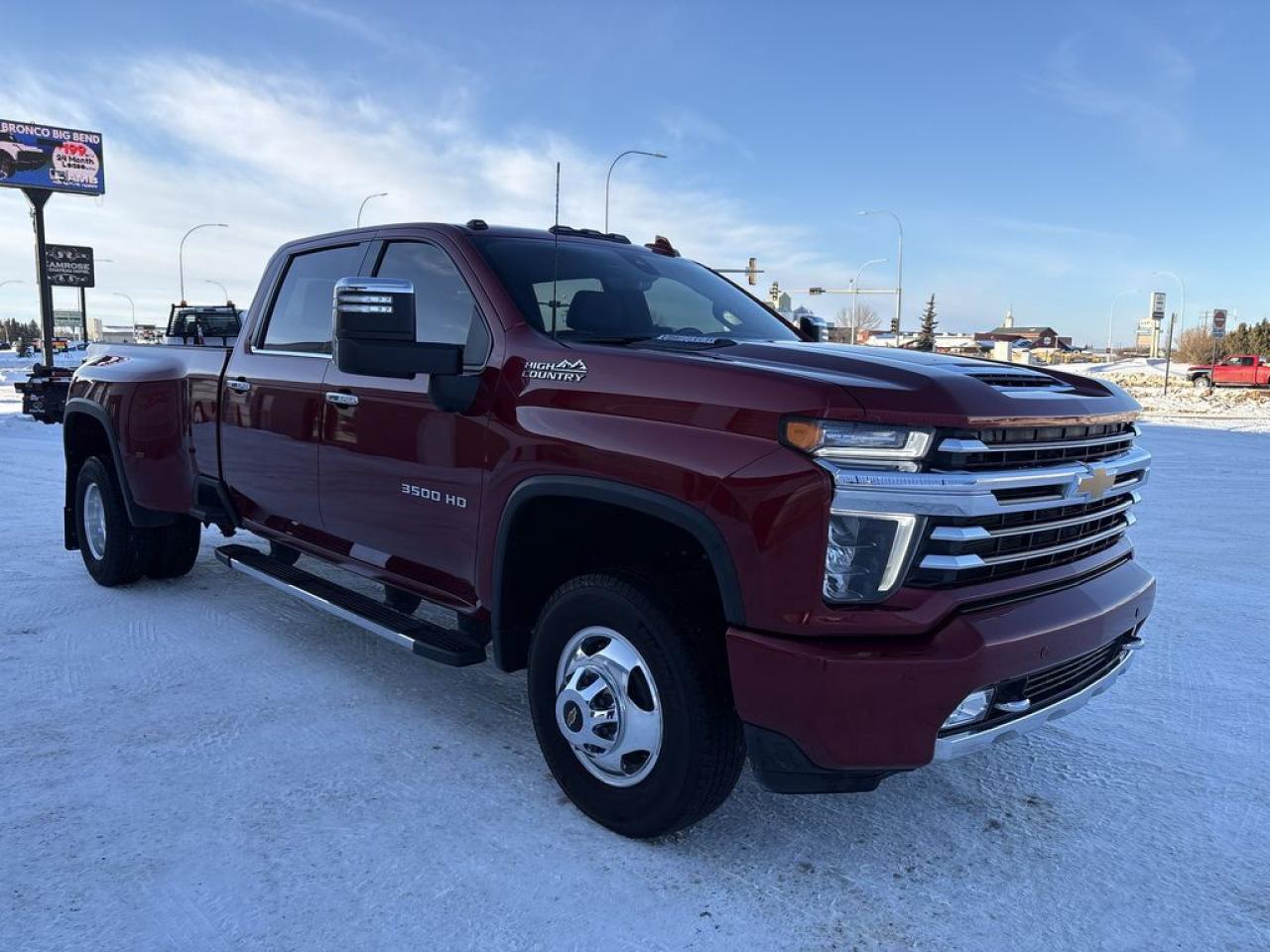 THE PRICE YOU SEE PLUS GST!!APPLE CARPLAY/ANDROID AUTO COMPATABLE6.6 LITER DURAMAX, 10 SPEED AUTO, HIGH COUNTRY DELUXE TRIM, 10 WAY POWER SEATS(F), HEATED/VENTED FRONT SEATS, 60/40 FOLDING REAR BENCH W/STORAGE, HIGH IDLE SWITCH, SNOW PLOW PREP PKG, DUAL ZONE CLIMATE CONTROL, BOSE PREMIUM AUDIO, REMOTE START.     RegenerateDeleteThe 2023 Chevrolet Silverado 3500 4WD High Country with the Duramax 6.6-liter engine and High Country Deluxe Package represents the pinnacle of heavy-duty pickup truck luxury and performance. Powered by the robust 6.6-liter Duramax turbo-diesel V8 engine, it delivers impressive torque and horsepower, making it well-suited for towing heavy loads and demanding work tasks. The 4WD system enhances off-road capability and traction in challenging conditions. The High Country trim is the flagship for luxury and advanced features, boasting premium interior materials, a sophisticated infotainment system with a large touchscreen, navigation, and a premium sound system. The Deluxe Package further elevates comfort with upgraded leather upholstery, heated and ventilated seats, a power-sliding rear window, and additional safety and convenience features such as advanced driver-assistance systems, a 360-degree camera, and upgraded exterior styling elements. Overall, this truck combines formidable power, exceptional durability, and refined luxury, making it a top choice for those needing a heavy-duty vehicle that doesnt compromise on comfort and technology.Do you want to know more about this vehicle, CALL, CLICK OR COME ON IN!*AMVIC Licensed Dealer; CarFax and Full Mechanical Inspection Included.