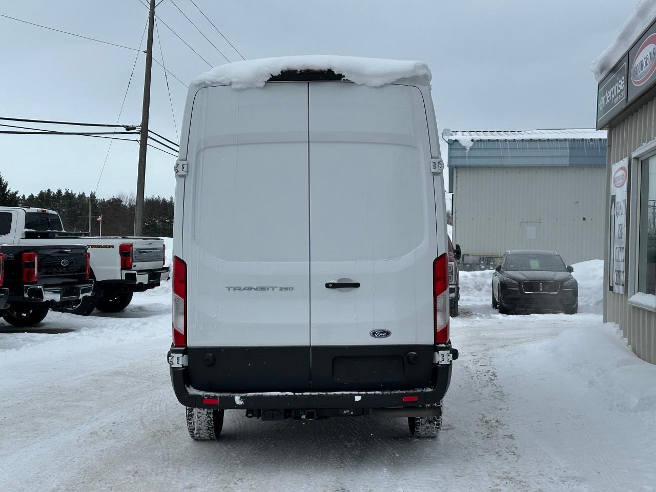 2022 Ford Transit Cargo Van T-250 148" Hi Rf 9070 GVWR RWD Photo