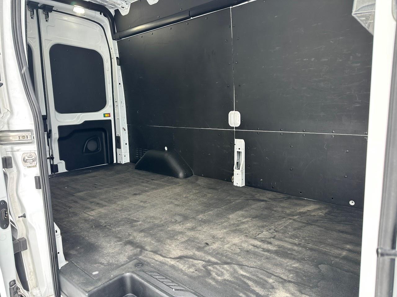 2022 Ford Transit Cargo Van T-250 148" Hi Rf 9070 GVWR RWD Photo