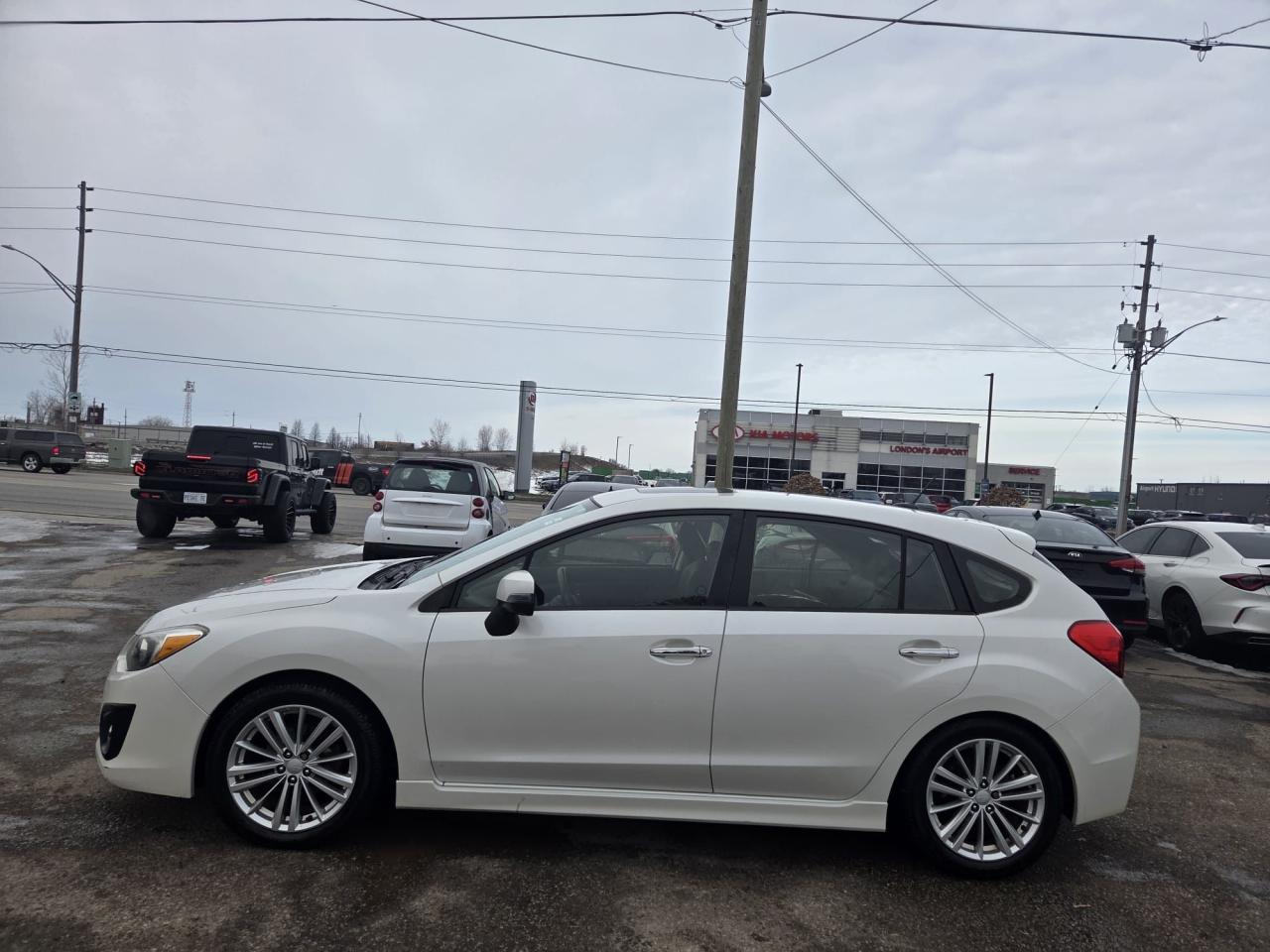 2013 Subaru Impreza 2.0i, LIMITED, LEATHER, ALLOYS, WELL MAINTAINED Photo