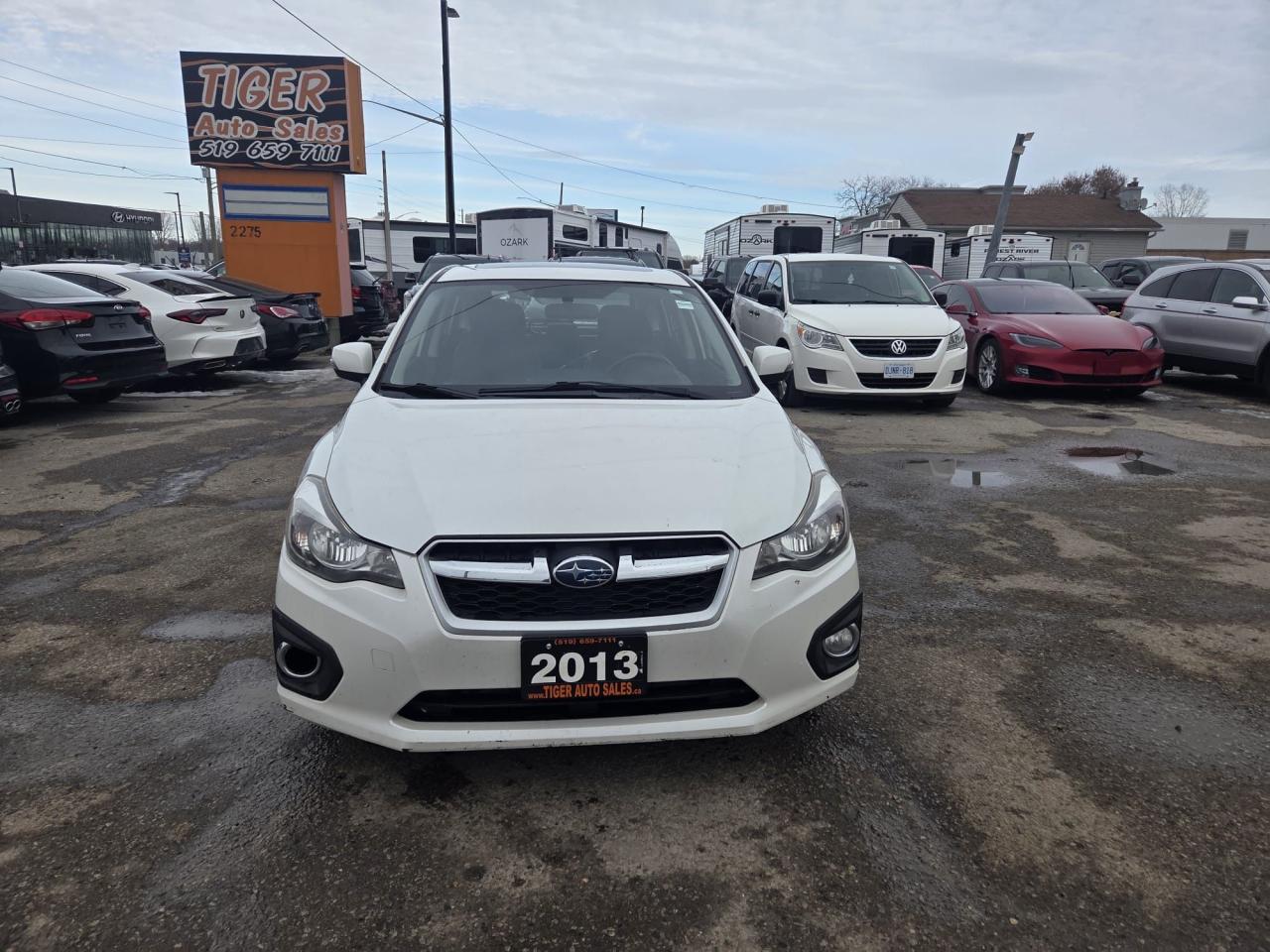 2013 Subaru Impreza 2.0i, LIMITED, LEATHER, ALLOYS, WELL MAINTAINED Photo