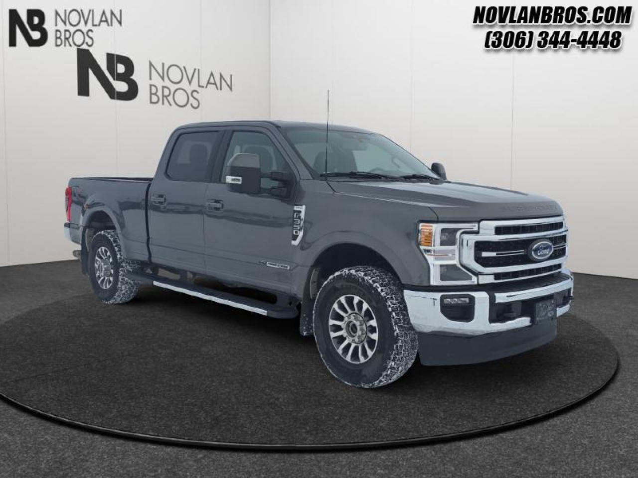 <b>Power Stroke, Heated Seats, Navigation, Leather Interior, Remote Engine Start!</b><br> <br> Check out our great inventory of pre-owned vehicles at Novlan Brothers!<br> <br>  Brutish power and payload capacity are key traits of this Ford F-350, while aluminum construction brings it into the 21st century. This 2022 Ford F-350 Super Duty is fresh on our lot in Paradise Hill. <br> <br>The most capable truck for work or play, this heavy-duty Ford F-350 never stops moving forward and gives you the power you need, the features you want, and the style you crave! With high-strength, military-grade aluminum construction, this F-350 Super Duty cuts the weight without sacrificing toughness. The interior design is first class, with simple to read text, easy to push buttons and plenty of outward visibility. This truck is strong, extremely comfortable and ready for anything. This  sought after diesel Crew Cab 4X4 pickup  has 84,933 kms. Its Carbonized Grey Metallic in colour. It has a 10 Speed Automatic transmission and is powered by a  475HP 6.7L 8 Cylinder Engine. This unit has some remaining factory warranty for added peace of mind. <br> <br> Our F-350 Super Dutys trim level is Lariat. Stepping up to this premium Ford F-350 Lariat is an excellent decision as it comes loaded with unique aluminum wheels, heated and cooled leather seats, a premium Bang & Olufsen audio system with SiriusXM radio, chrome exterior accents with a built-in rear bumper step, a Class V trailer hitch and power extendable trailer style mirrors. It also includes a colour touchscreen with SYNC 4, Apple CarPlay and Android Auto, side running boards, power front seats, a digital dash, FordPass Connect 4G LTE with a smart device remote start, a power locking tailgate, Ford Co-Pilot360 with rear parking sensors, blind spot detection, a leather steering wheel, lane departure warning, automatic emergency braking, dual zone climate control, power adjustable pedals and so much more. This vehicle has been upgraded with the following features: Power Stroke, Heated Seats, Navigation, Leather Interior, Remote Engine Start, Rear View Camera, Reverse Sense System. <br> To view the original window sticker for this vehicle view this <a href=http://www.windowsticker.forddirect.com/windowsticker.pdf?vin=1FT8W3BT2NEC52305 target=_blank>http://www.windowsticker.forddirect.com/windowsticker.pdf?vin=1FT8W3BT2NEC52305</a>. <br/><br> <br>To apply right now for financing use this link: <a href=http://novlanbros.com/credit/ target=_blank>http://novlanbros.com/credit/</a><br><br> <br/><br>The Novlan family is owned and operated by a third generation and committed to the values inherent from our humble beginnings.<br> Come by and check out our fleet of 20+ used cars and trucks and 50+ new cars and trucks for sale in Paradise Hill.  o~o