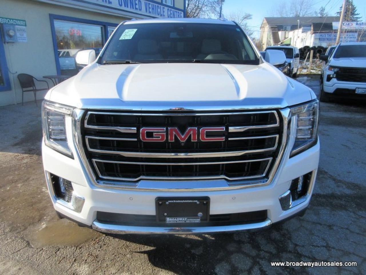 2022 GMC Yukon LOADED SLT-VERSION 7 PASSENGER 5.3L - V8.. 4X4.. CAPTAINS.. 3RD ROW.. PANORAMIC SUNROOF.. LEATHER.. HEATED/AC SEATS.. BACK-UP CAMERA.. BOSE AUDIO.. Photo