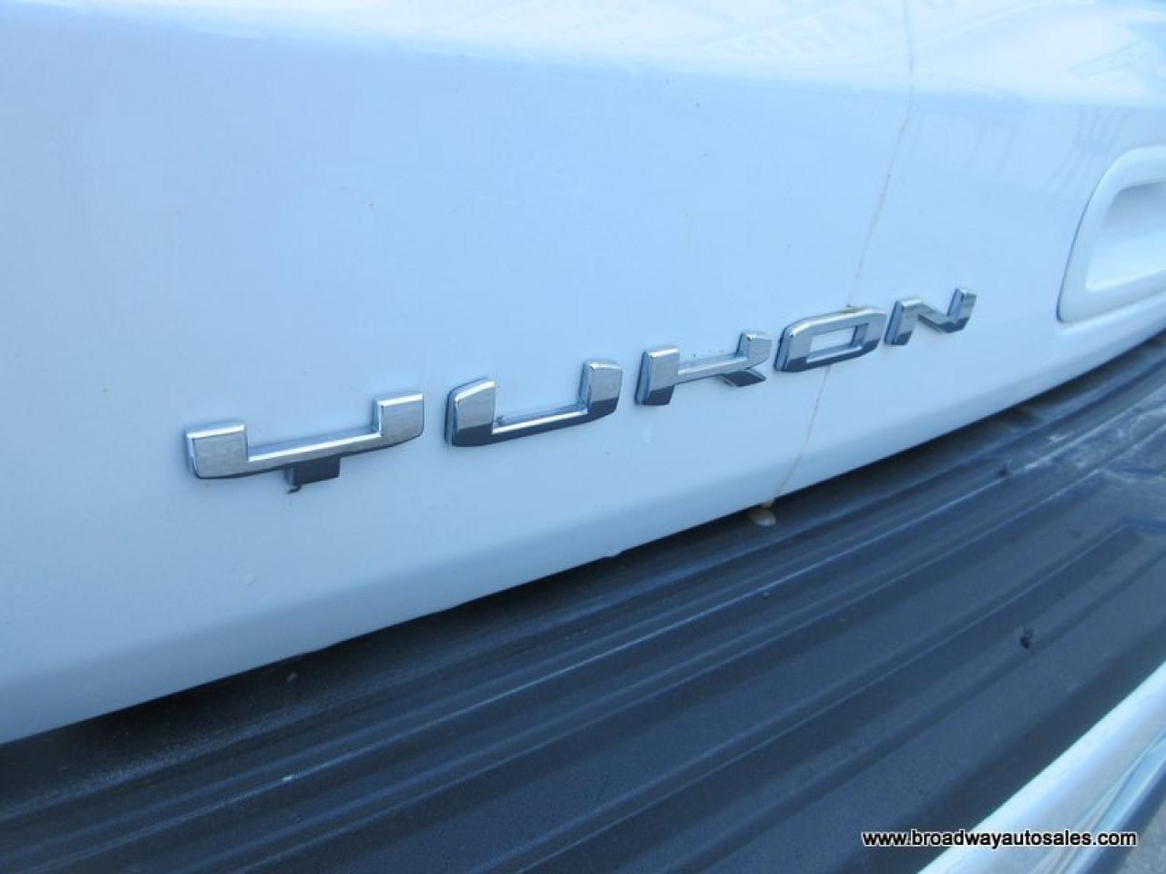 2022 GMC Yukon LOADED SLT-VERSION 7 PASSENGER 5.3L - V8.. 4X4.. CAPTAINS.. 3RD ROW.. PANORAMIC SUNROOF.. LEATHER.. HEATED/AC SEATS.. BACK-UP CAMERA.. BOSE AUDIO.. Photo