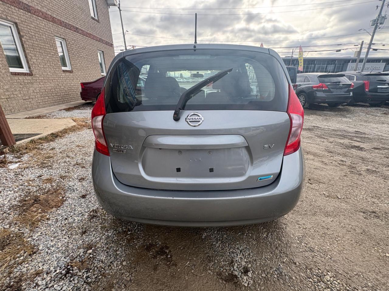 2015 Nissan Versa Note Certified • 1 Year Warranty Included • Fuel Efficient Photo