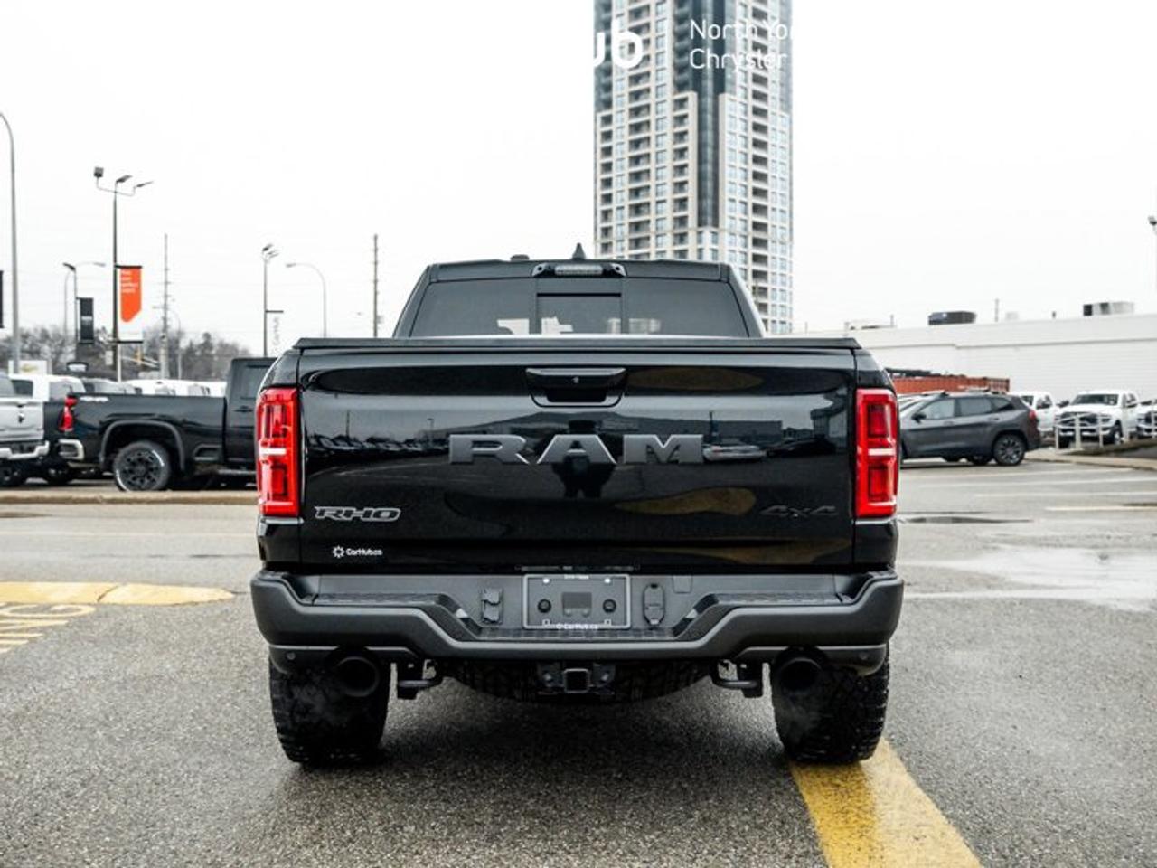 2026 RAM 1500 RHO 4x4 Crew Cab 5'7" Box Panoroof Trailer Tow Group Tonneau Cover Photo